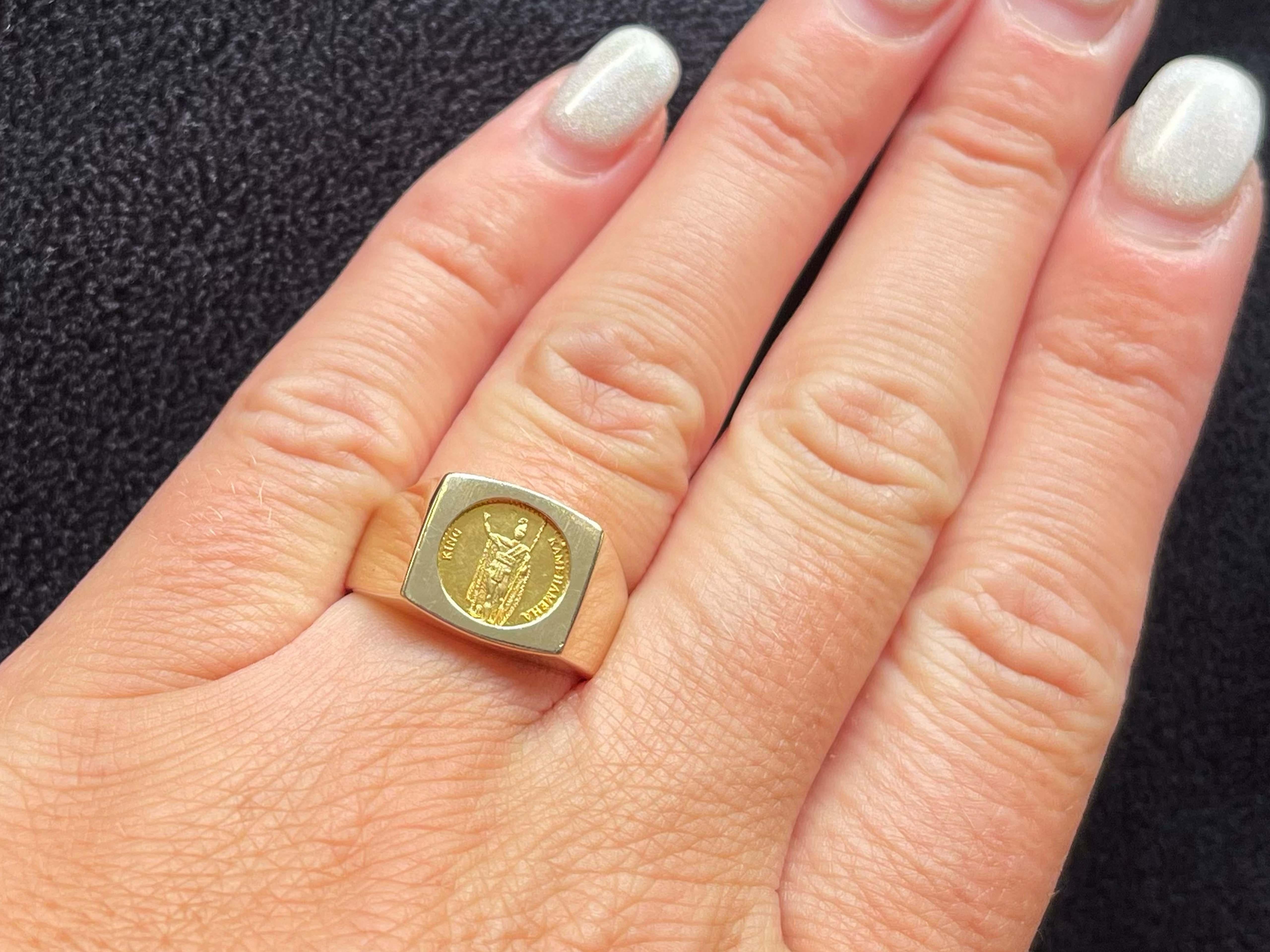Item Specifications:

Metal: 14K Yellow Gold

Style: Statement Ring

Ring Size: 7.25 (resizing available for a fee)
​
​Gold Coin: 24K Hawaii Gold Coin

Total Weight: 6.0 Grams

​Condition: Preowned, excellent