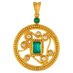 Médaillon pour femmes avec émeraudes et diamants 24 carats