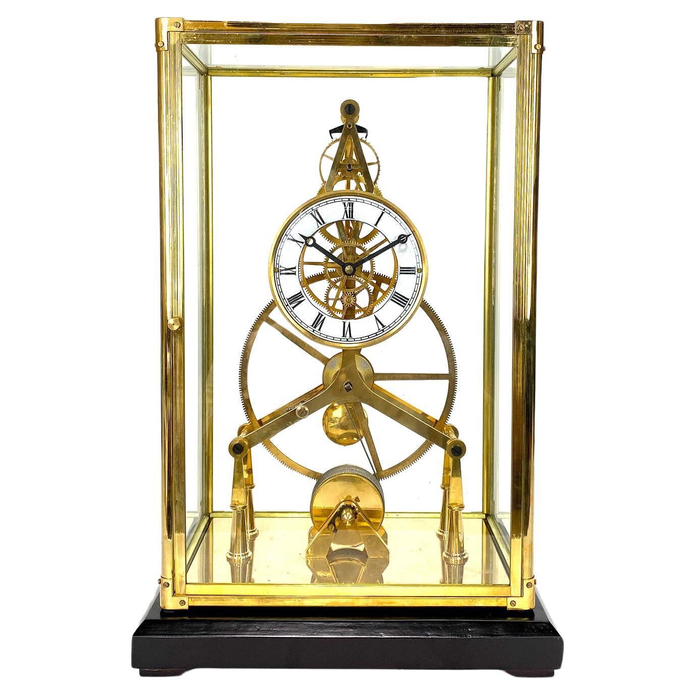 24K Gold Plated 8 Day Great Wheel Fusee Driven Porcelain Dial Skeleton Clock For Sale