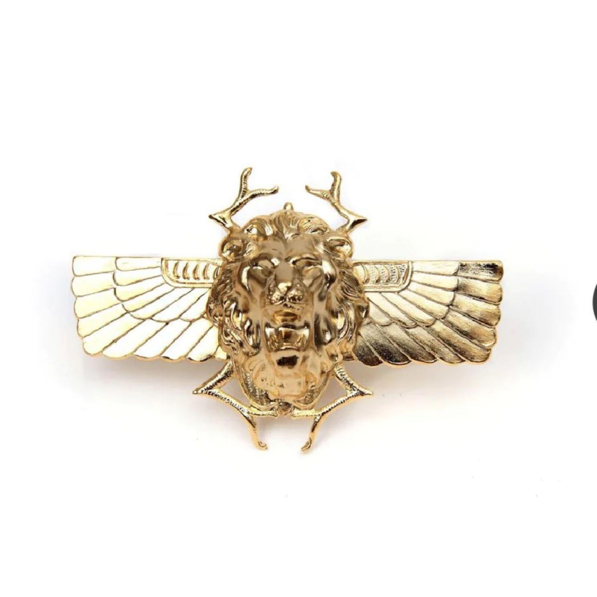 The ultimate power cocktail ring represents Egypt’s scarabs and king lion signifying strength and ultimate luxury. Channel your inner Cleopatra. Made in America. Gold plated on Brass.

Additional Information:
Material: 24K Gold, Brass
Dimensions: W