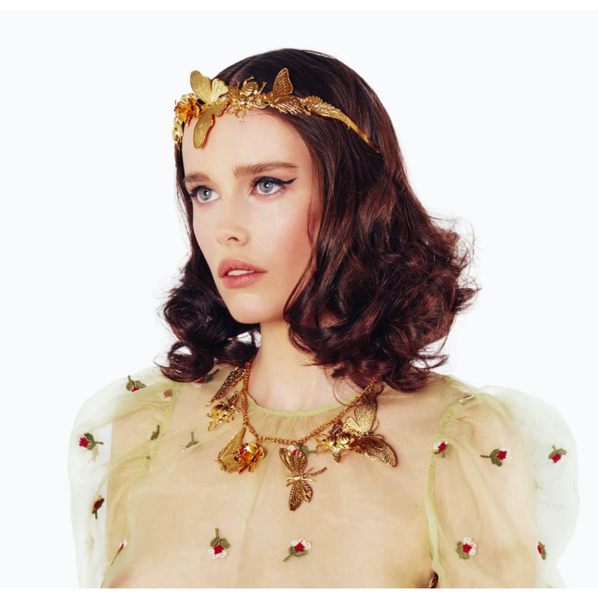 Step into a world of natural elegance with the Secret Garden Charm Necklace — a timeless piece crafted to embody the harmony of nature and femininity. Featuring delicate butterfly, dragonfly, and bee charms, this 24K gold-plated necklace is more