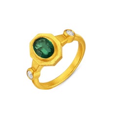 24k Gold Ring for Woman with Oval Cut Emerald and Diamonds