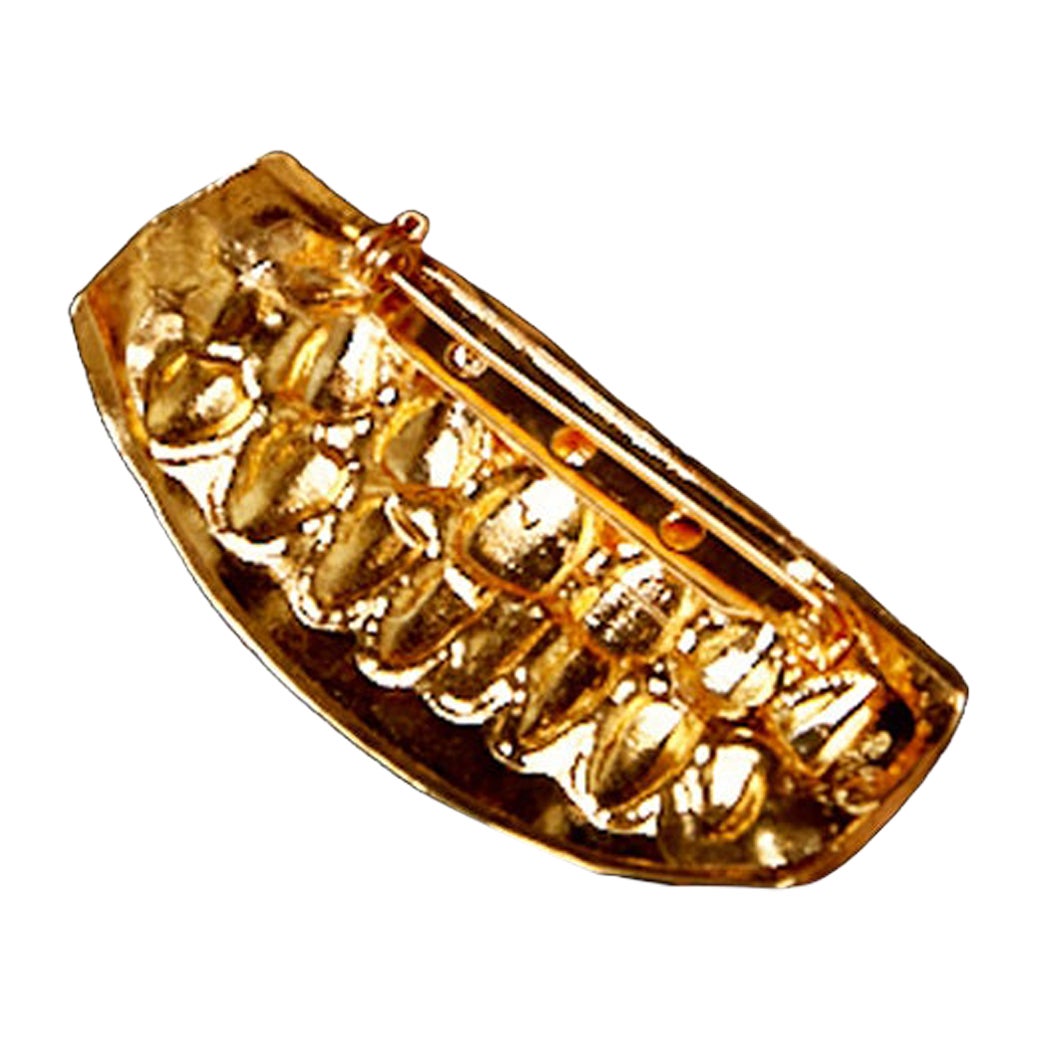 Selvaggio. Divertimento. Giocoso. Indossa i tuoi denti sulla manica con il bracciale Mordekai Grillz. Muffa 