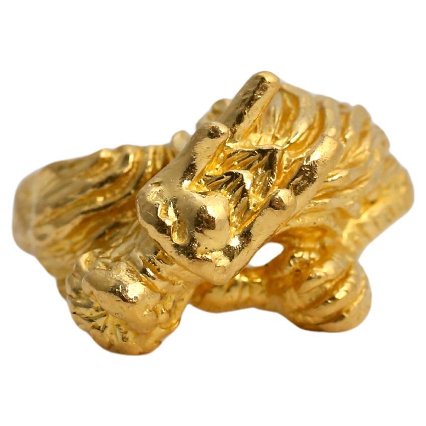 This stunning 24K yellow gold 3D dragon ring is a remarkable piece of craftsmanship, embodying power, strength, and prosperity. The intricate detailing showcases a three-dimensional Chinese dragon, a symbol of wisdom and good fortune. The dragon's