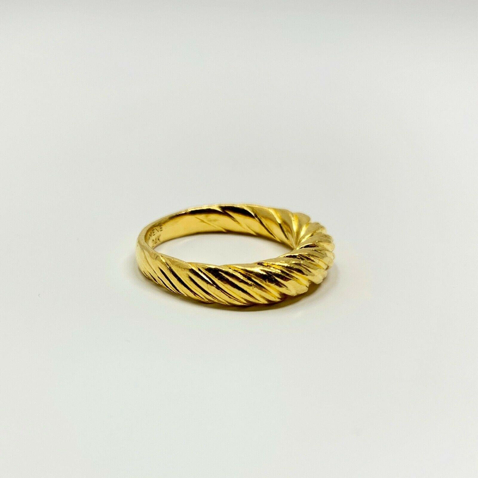 24k Solid Yellow Gold 12.4g Mene Torc Ring Size 9

Condition:  Excellent (Professionally Cleaned and Polished)
Metal:  24k Gold (Marked, and Professionally Tested)
Weight:  12.4g
Size:  9
Band Width:  5mm at widest, 3.5mm at narrowest
Ring Height