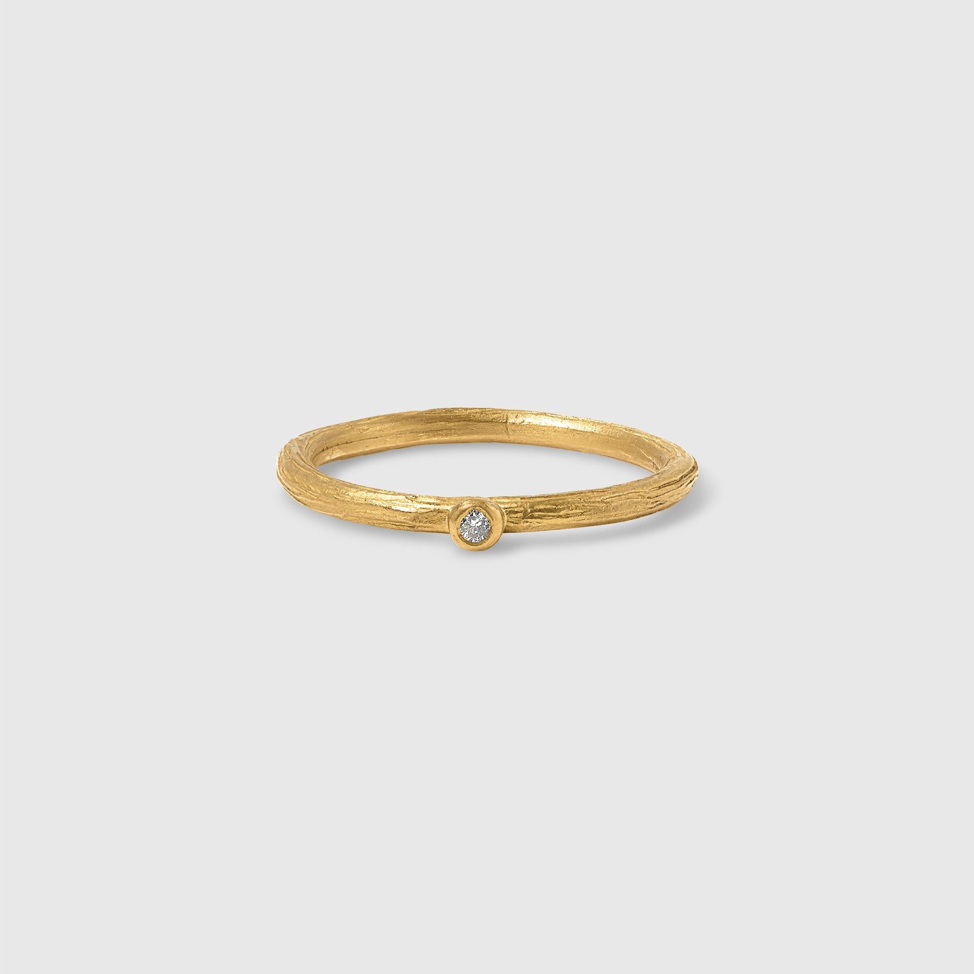 24K Solid Yellow Gold Stacker Ring with Single Diamond, Handmade in Istanbul . Listing is for one ring only.
Gold ring is 2.98 grams of 24K yellow gold with one, 0.02 ct diamond.  (2 are available in size 7)
Perfect for stacking, stackable rings.
