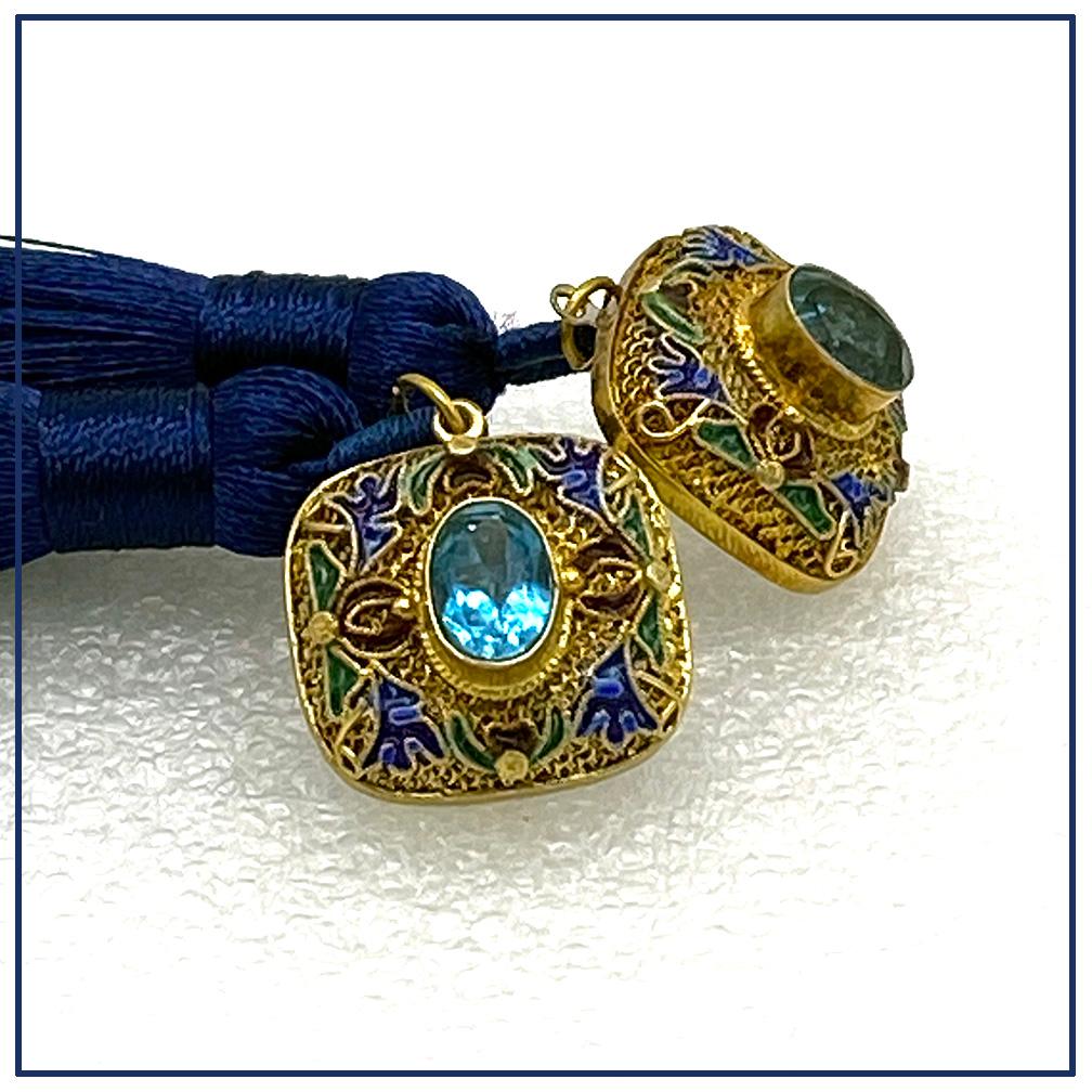This is a pair of 24K vermeil cloisonne with blue topaz earrings and they come with 4 inch dangling dark blue silk tassels. These modern small square post earrings are cloisonné (filigree and enamel) work with Chinese traditional motifs and have