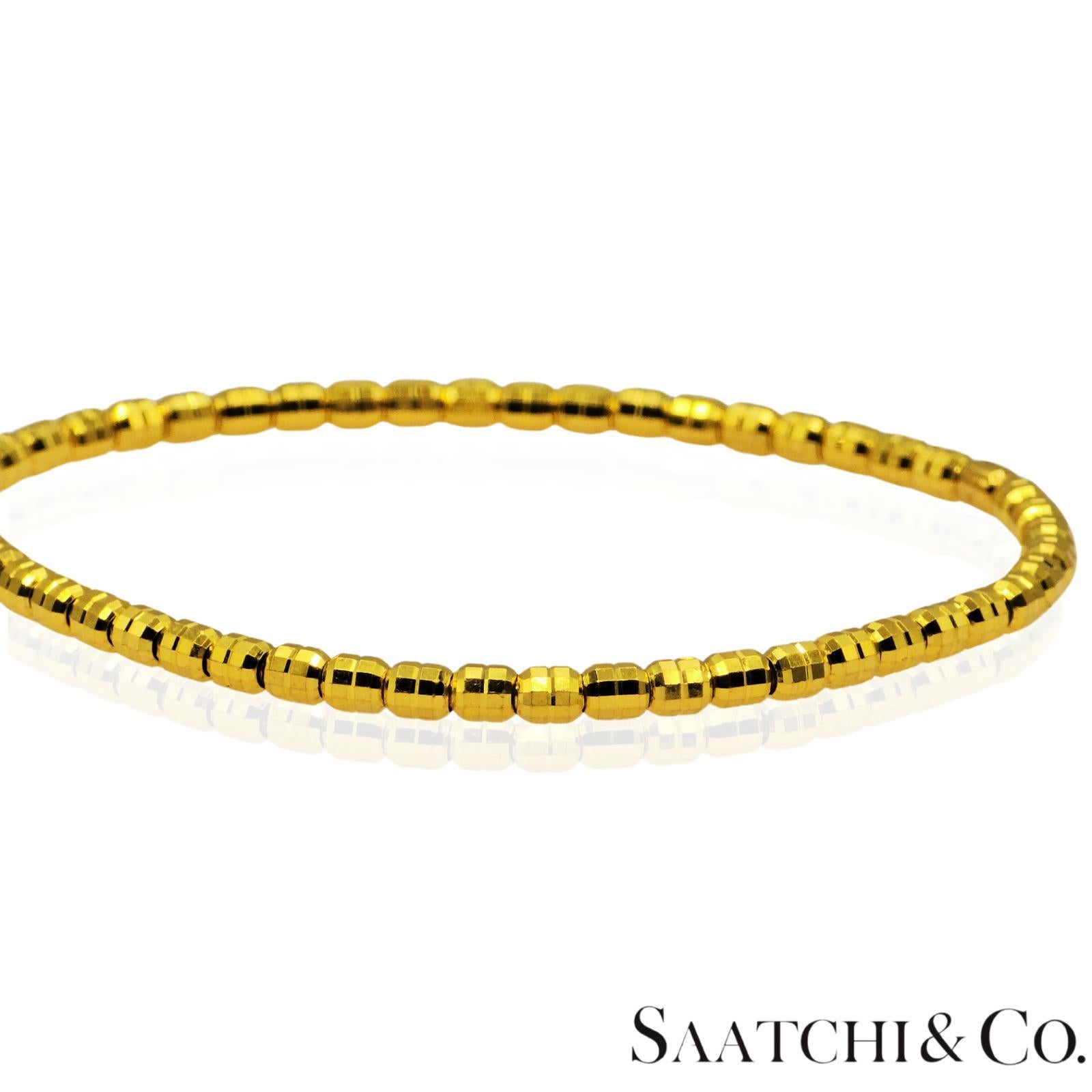 Pulsera elástica extensible de oro amarillo de 24 quilates de 7,12 gramos. en Excelente estado para la venta en New York, NY