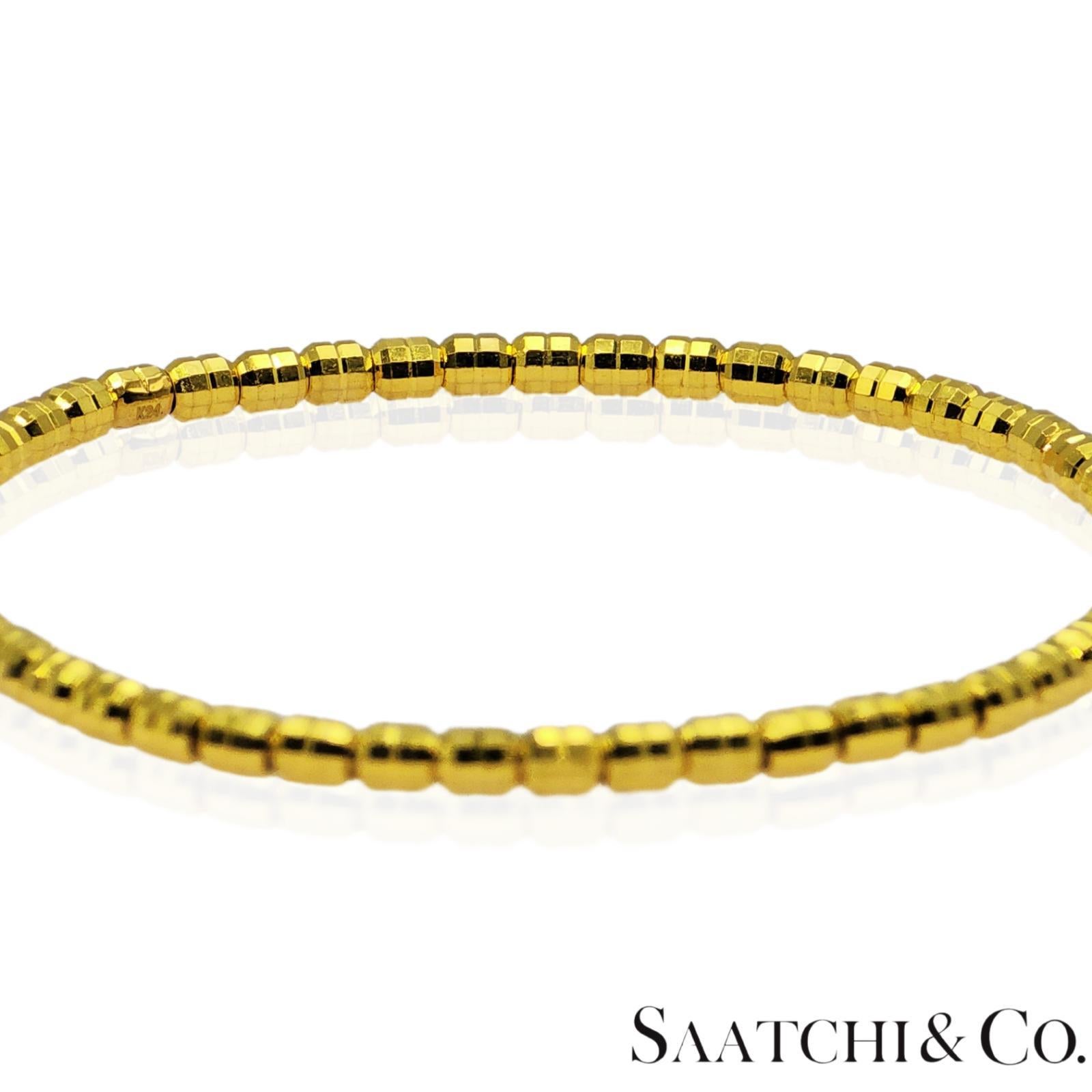 Femenino o masculino Pulsera elástica extensible de oro amarillo de 24 quilates de 7,12 gramos. en venta