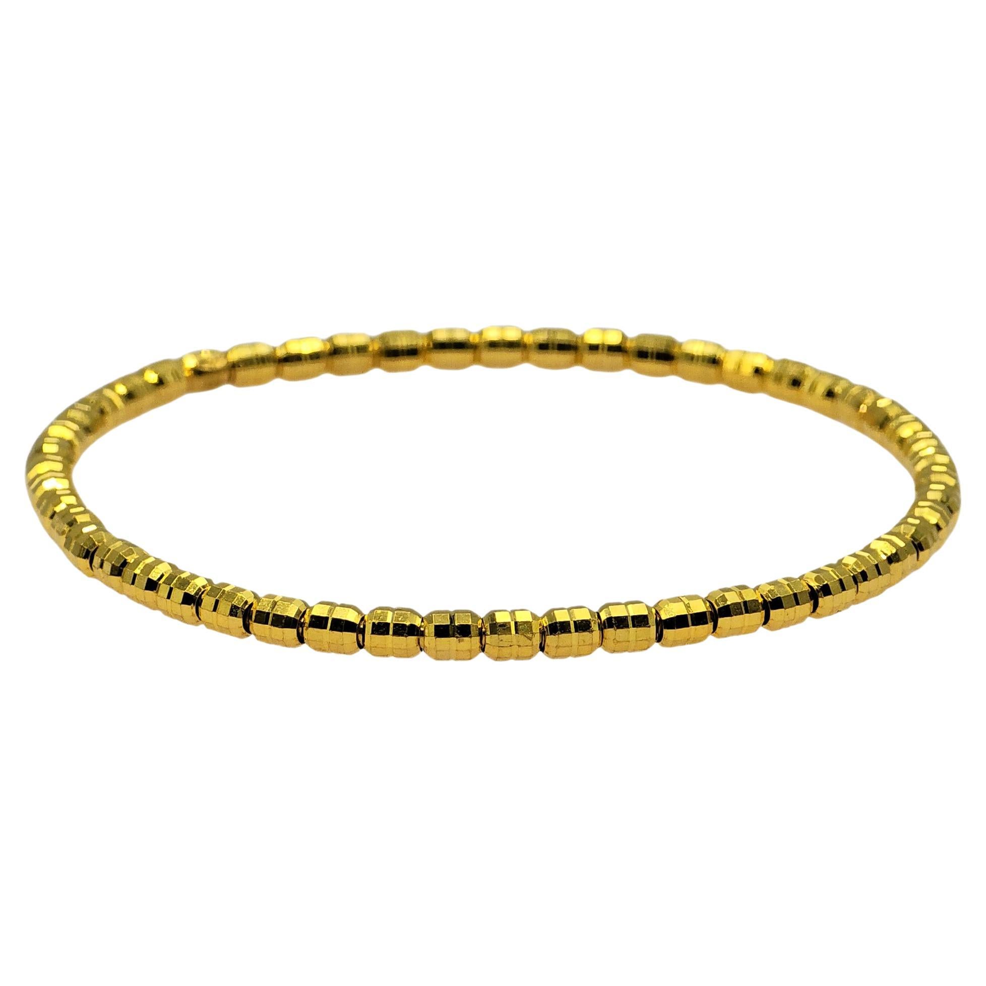Pulsera elástica extensible de oro amarillo de 24 quilates de 7,12 gramos. en venta