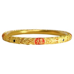 Bracelet rigide en filigrane en or jaune 24 carats (Au999,9) orné d'un symbole de bénédiction