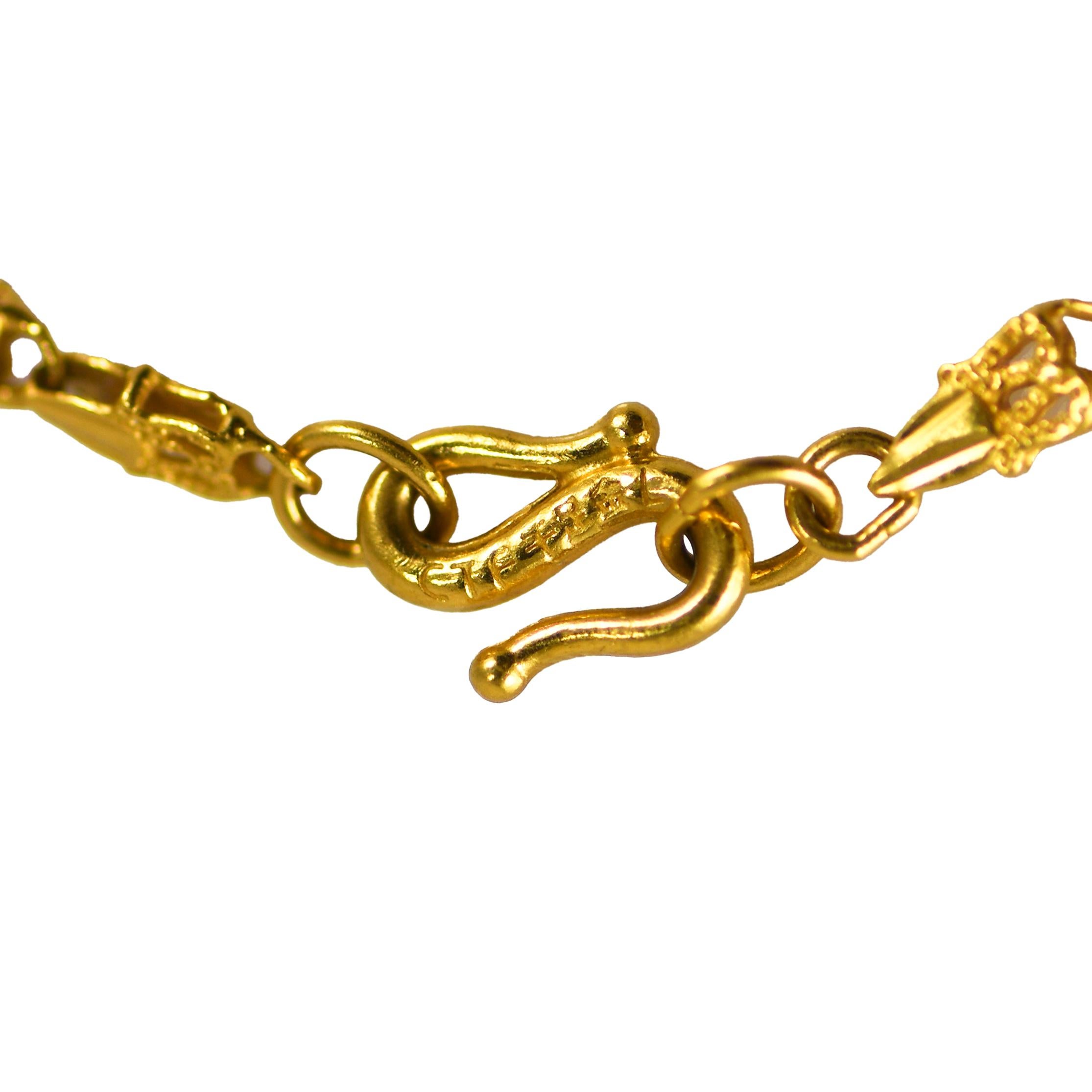 24k bracelet with fancy style links.
Tests 24k, weighs 5.6g
will fit 7 1/4in wrist