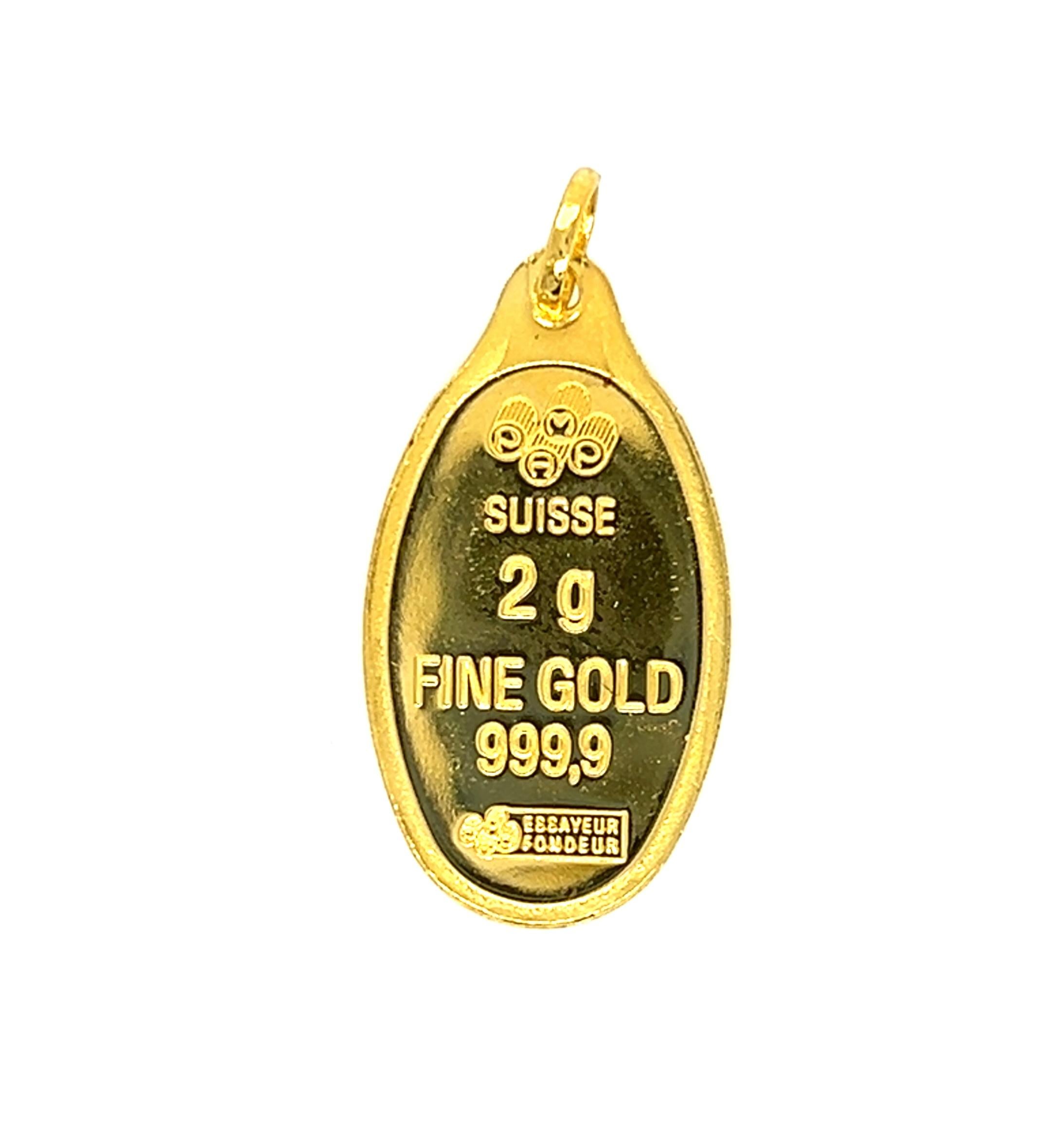 24k yellow gold PAMP Suisse Switzerland pendant or charm. The front depicts Cleopatra, the last Queen of Ancient Egypt. The back is stamped: SUISSE, 2g, FINE GOLD, 999,9
This pendant comes in its original packaging complete with assay certificate