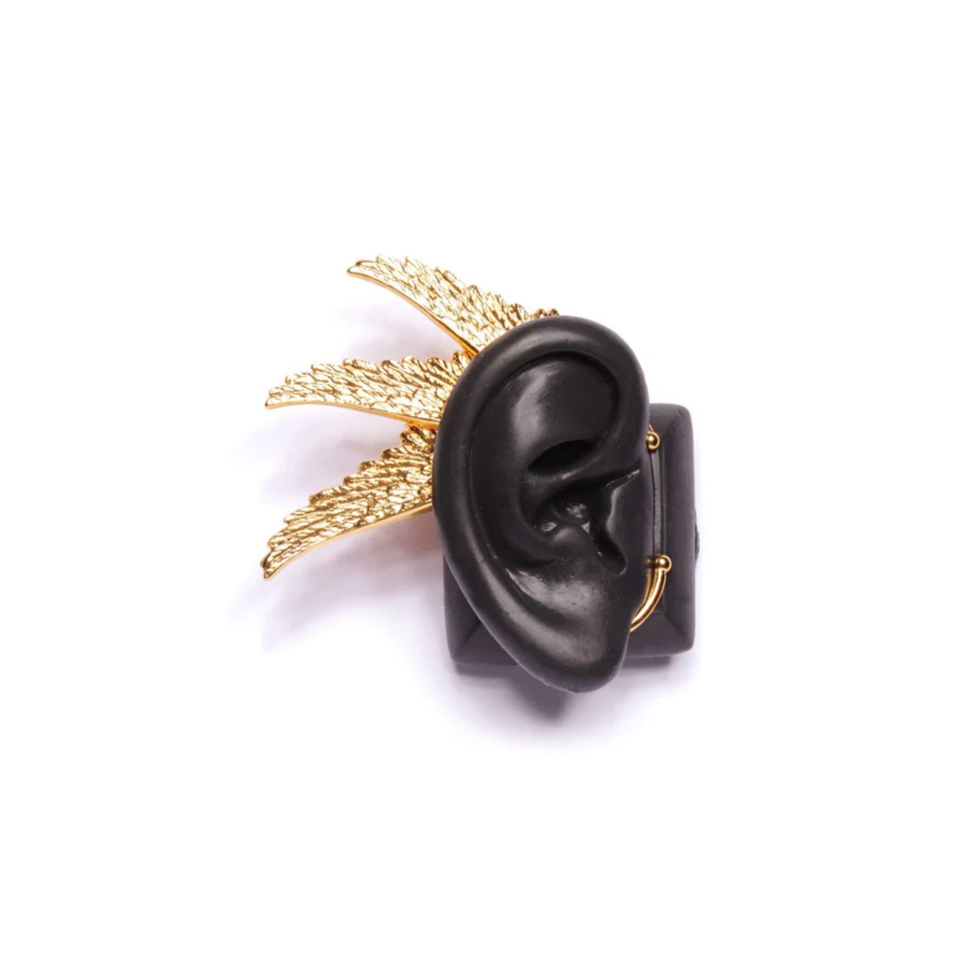 Our winged earcuff frames your ear and can be worn with the wing upward to hold your hair, or downward for an earring effect. It really is the ultimate conversation piece and all you need to really spread your wings and fly. 

Additional