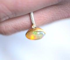 24kt Gold and Silver Oval, Pearlescent Opal Ring with Side Diamonds