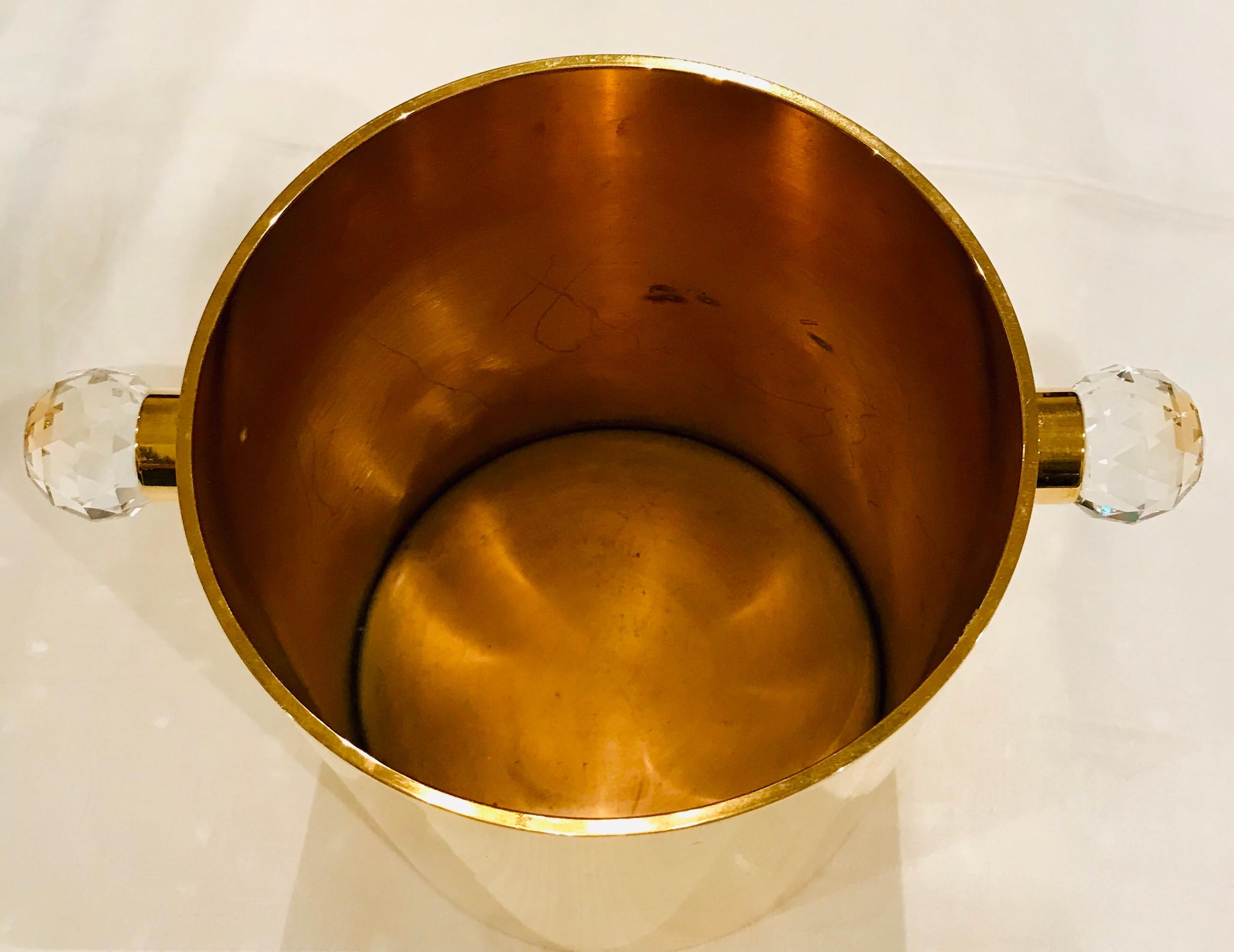 24-karat gold-plated solid brass Champagne bucket with large Swarovski crystal handles is pure Hollywood Glam.



 