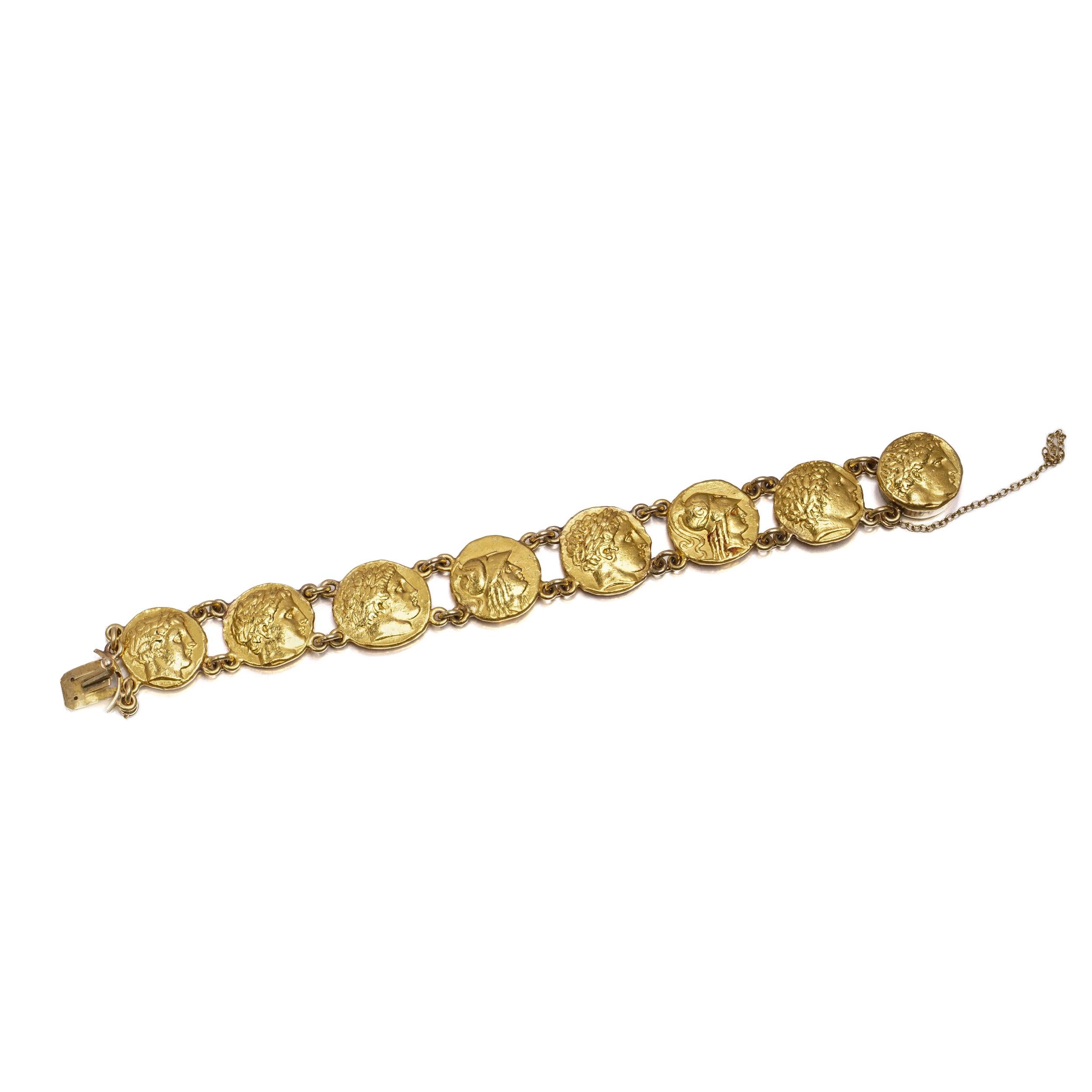 A bold and historically inspired bracelet composed of a series of coin-motif links, each modelled in high-relief with classical and mythological imagery. Crafted in 24 karat yellow gold, the bracelet features eight round links joined by articulated