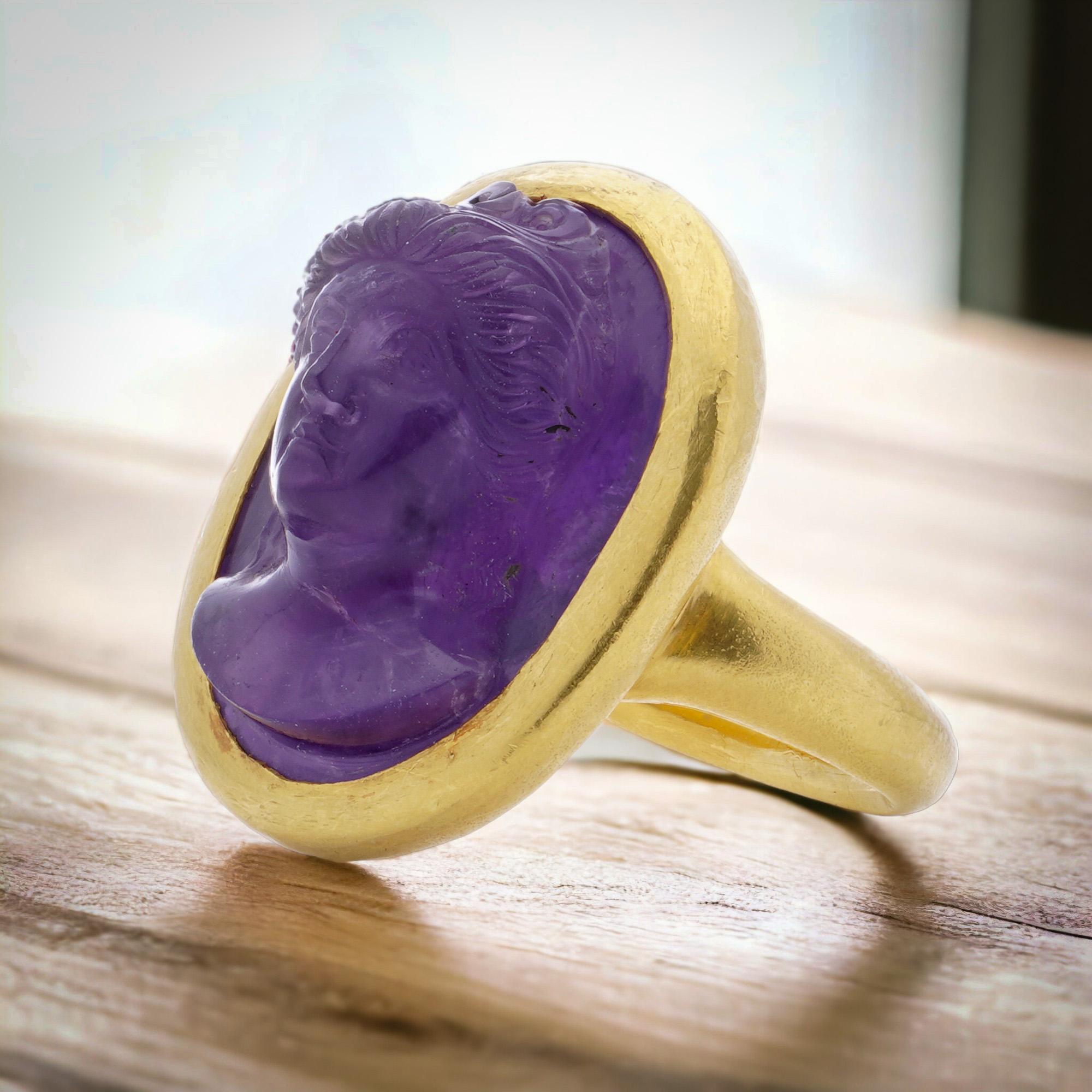 Antique 19th century 24kt. yellow gold carved amethyst intaglio ring with a woman's portrait. 
Made in Europe, Circa 1870's 
X-Ray has been tested positive for 24kt. yellow gold. 

The dimensions - 
Ring Size: Length x Width x depth: 3.7 x 2.2 x 1.6