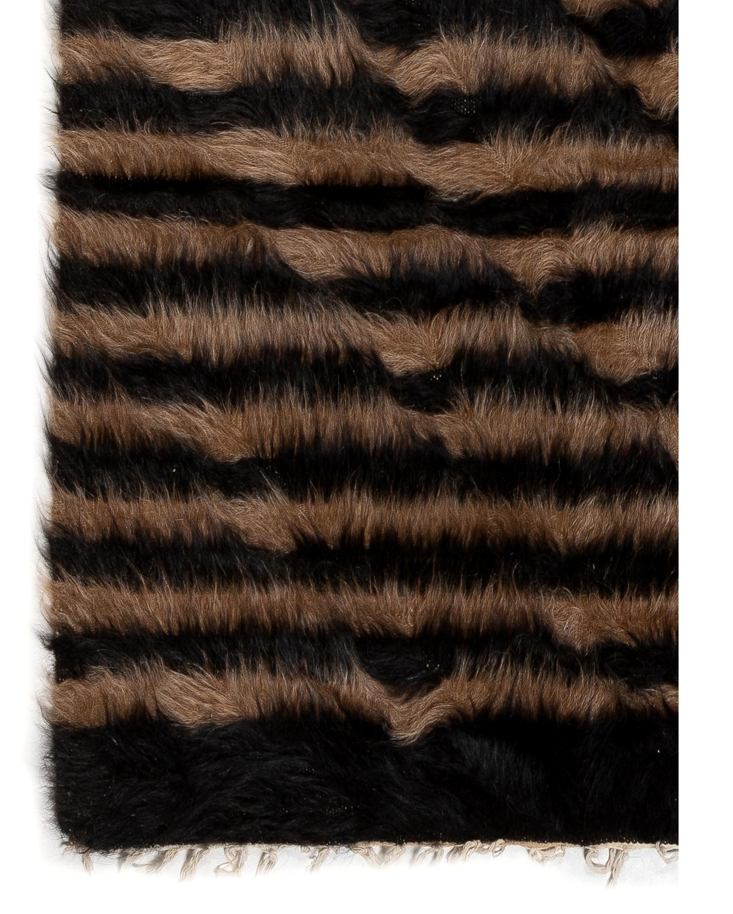 A brand new hand-woven rug from Eastern Turkey. Measures: 24