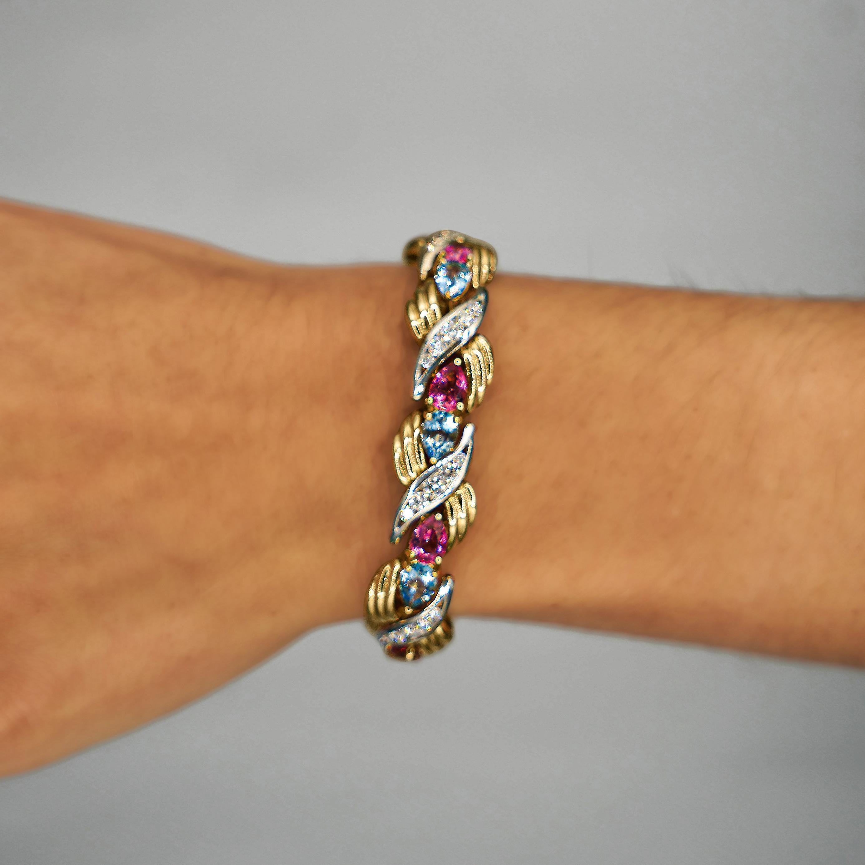 Taille ovale Bracelet rétro en or 18 carats avec aigue-marine, tourmaline et diamants de 25 carats en vente