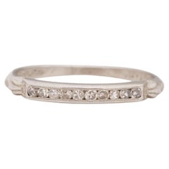 Fascia nuziale in platino con diamante Art Deco da .25 carati