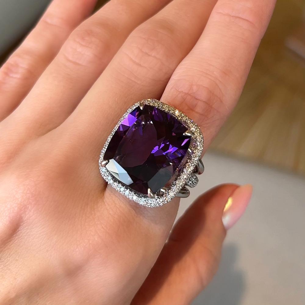 Since ancient times purple color has been a sign of the royalty. 
In ancient Rome only few people could wear white toga with a purple stripe. 
Big purple natural amethyst in this ring is from Brazil, it is clean, transparent, vibrant color and it
