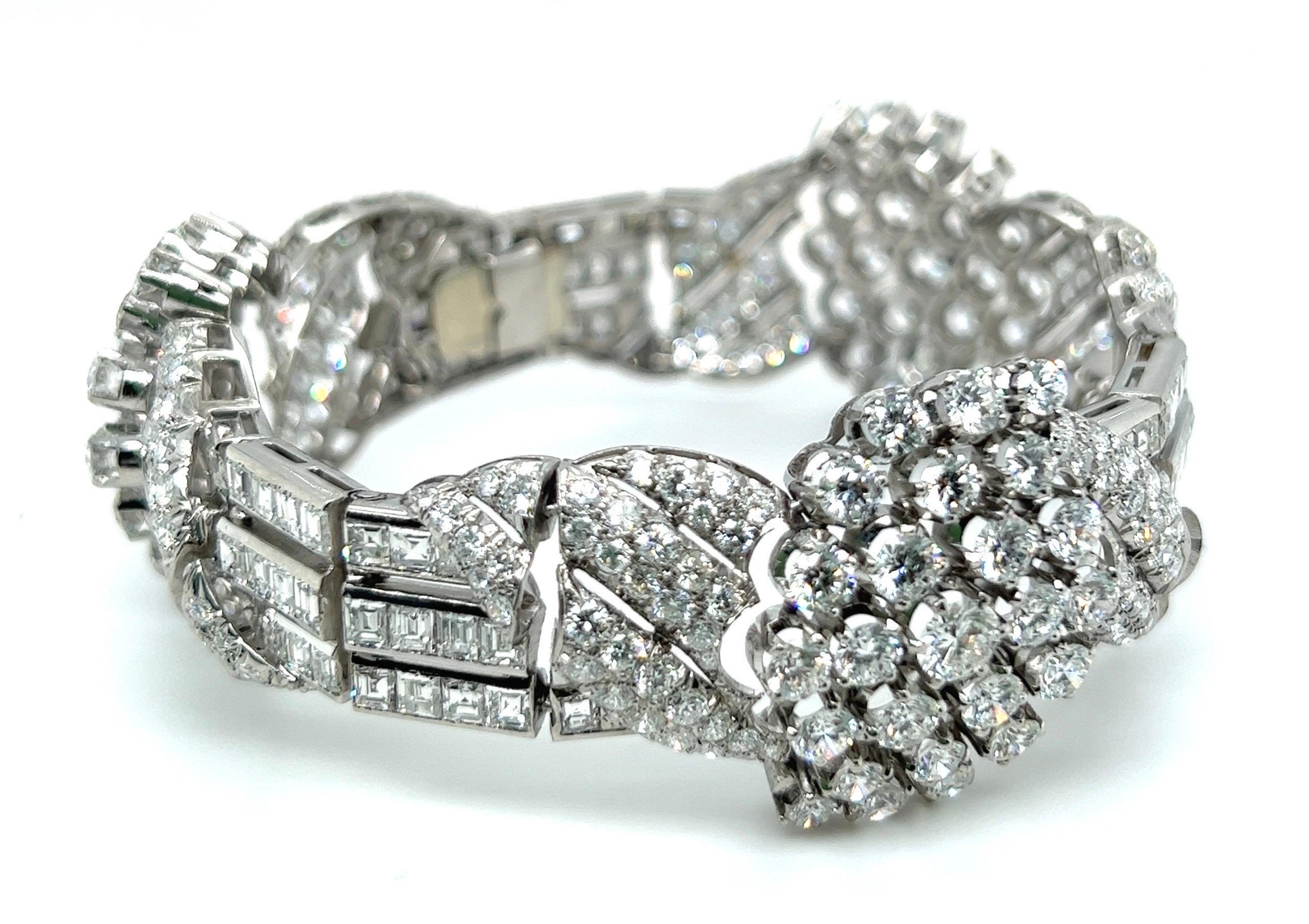 Opulent and ladylike circa 25 carat diamond and platinum cocktail bracelet, circa 1950s.

Elegant bracelet of floral design, entirely crafted in platinum and set with 75 brilliant-cut diamonds totalling circa 11 carats, 234 smaller brilliant-cut