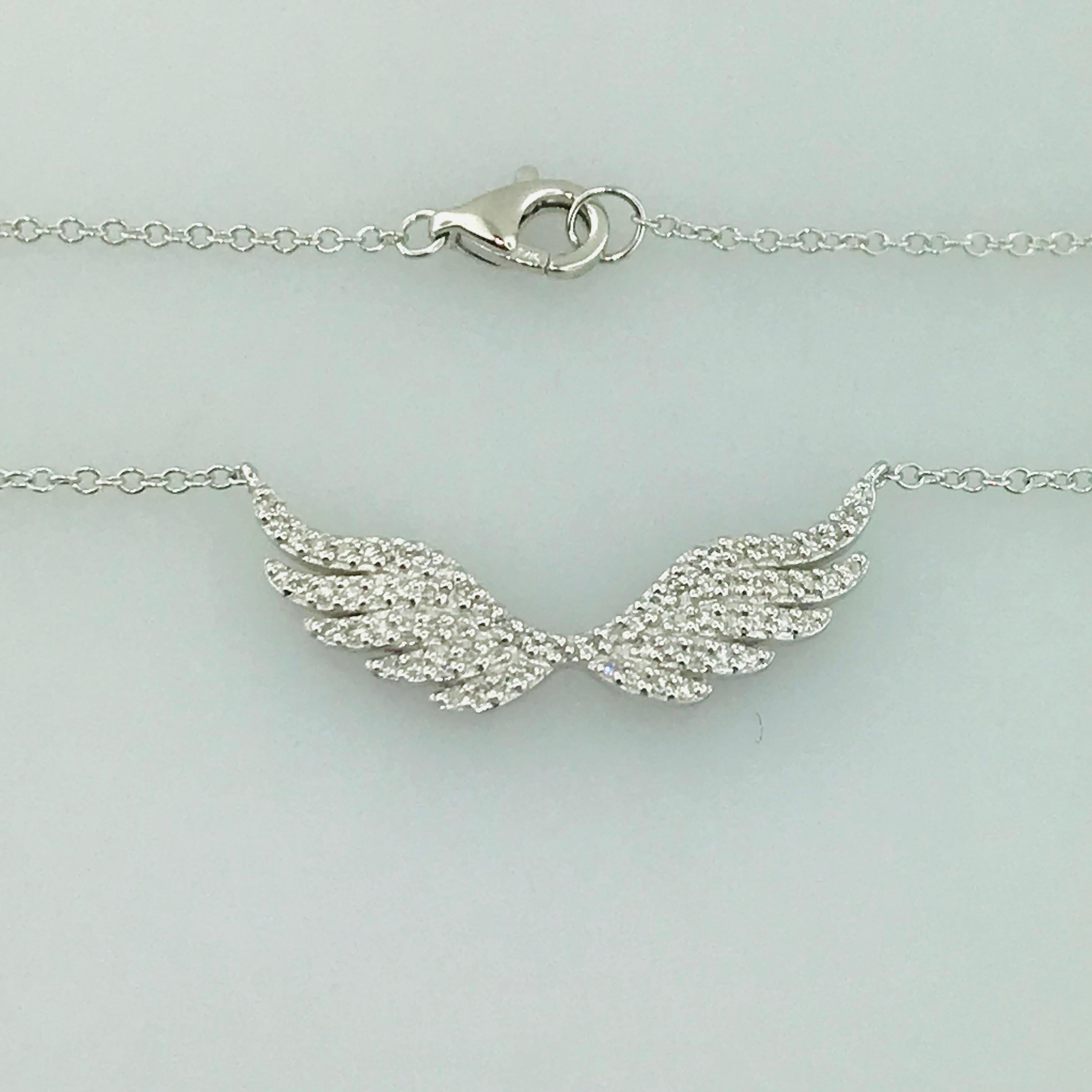 How sweet and precious is this diamond angel wings necklace? It is truly special and beautiful. What a great piece to wear every day or a great gift for someone deserving. This adorable diamond angel wing necklace has grace, beauty and bling! The