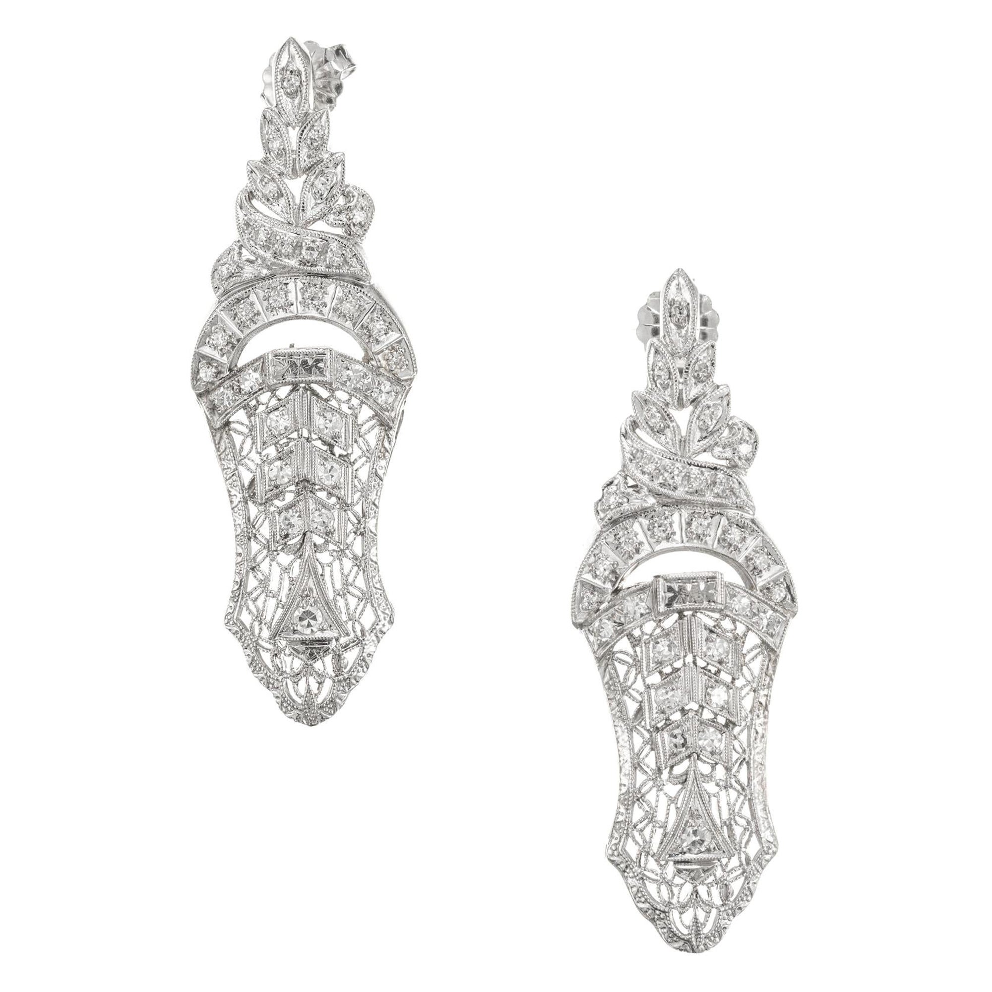 Boucles d'oreilles en goutte ajourées en or et diamant