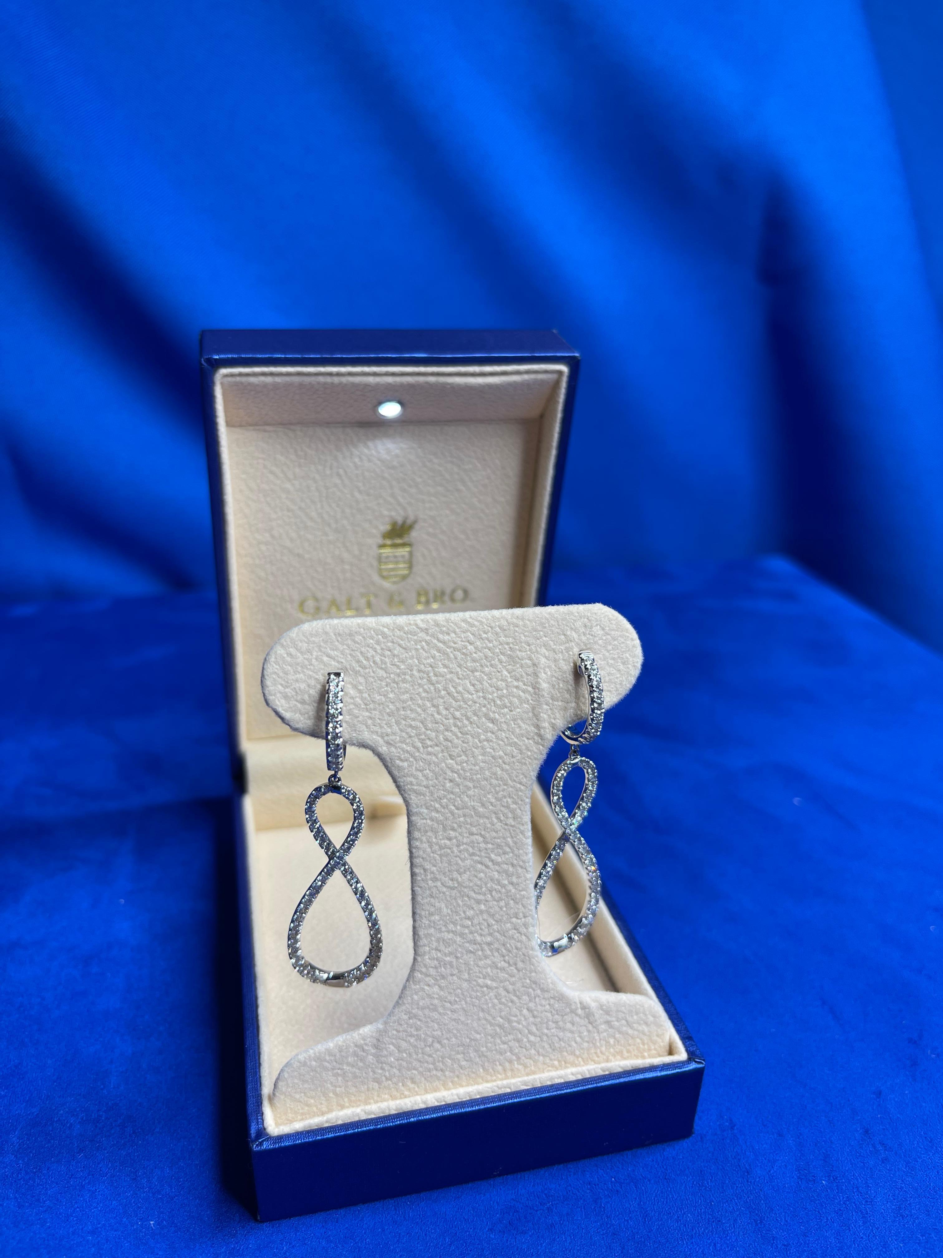 2.5 Carat Diamond Hoop 14 Karat White Gold Drop Infinity Eight Huggie Earrings In New Condition For Sale In Oakton, VA