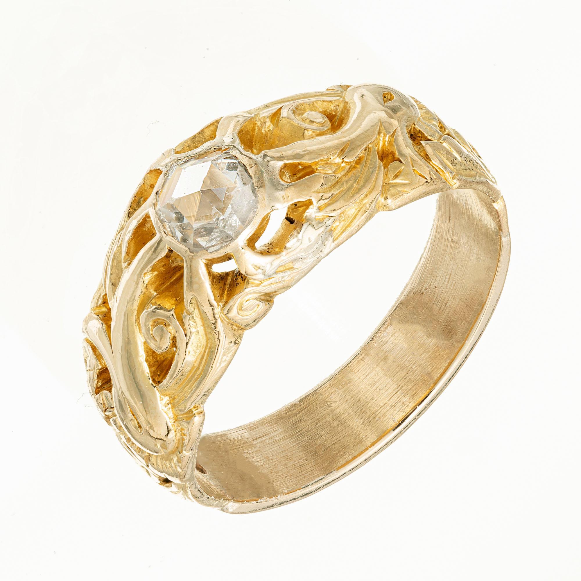 Handmade original Art Nouveau .25 carat rose cut diamond in a pierced and carved 18k yellow gold engagement setting.  

1 rose cut diamond, H SI approx. .25cts
Size 7.25 and sizable 
18k yellow gold 
Stamped: 18k
6.9 grams
Width at top: 7.9mm
Height