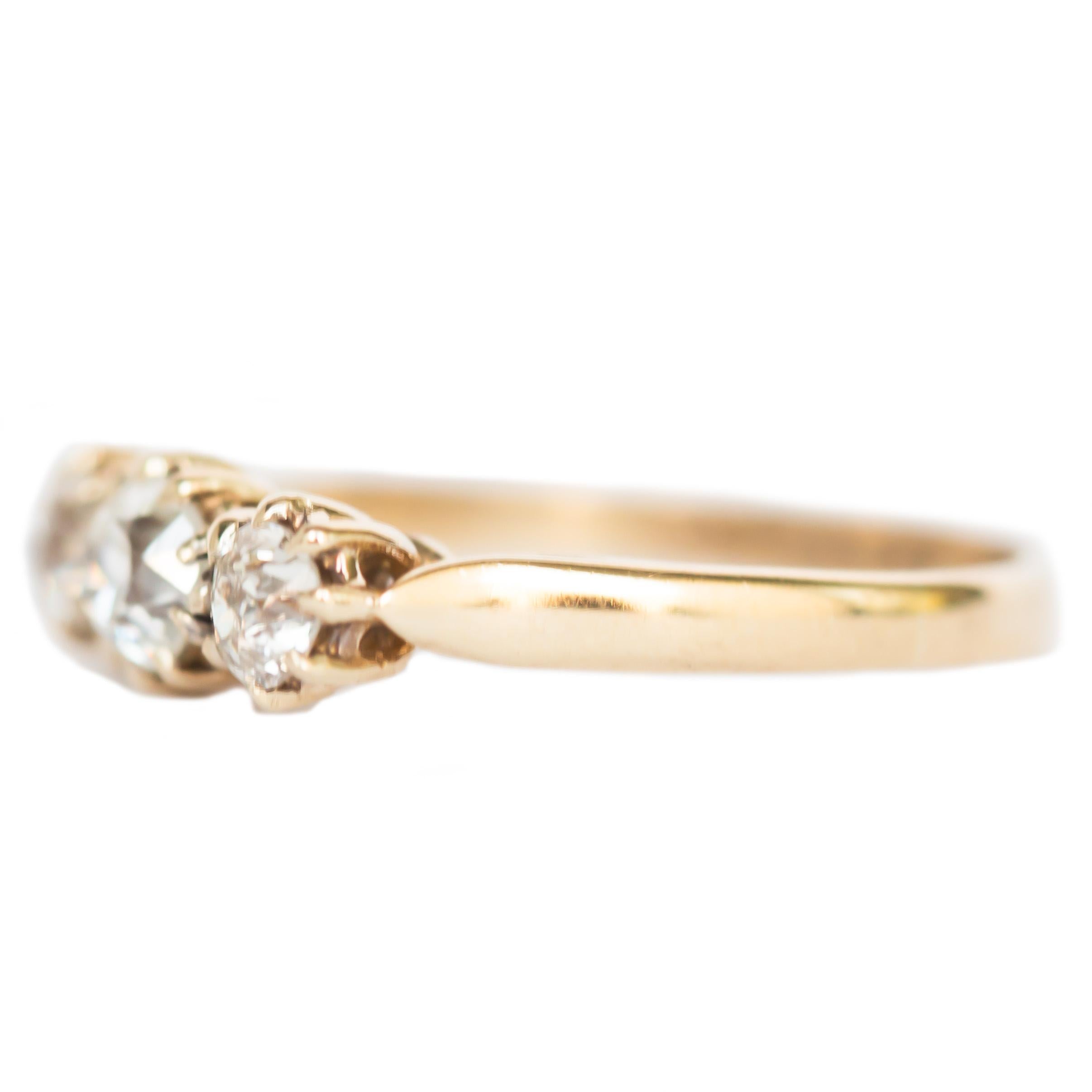 Ring Size: 6.95
Metal Type: 14 karat Yellow Gold
Weight: 2.0 grams

Center Diamond Details
Shape: Old Mine Brilliant 
Carat Weight: .25 carat
Color: I
Clarity: VS

Side Stone Details: 
Shape:Old Mine Brilliant 
Total Carat Weight: .25 carat total