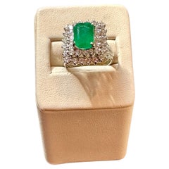 3 Carat Emerald Cut Emerald & 2 Carat Diamond Ring 14 Karat White Gold