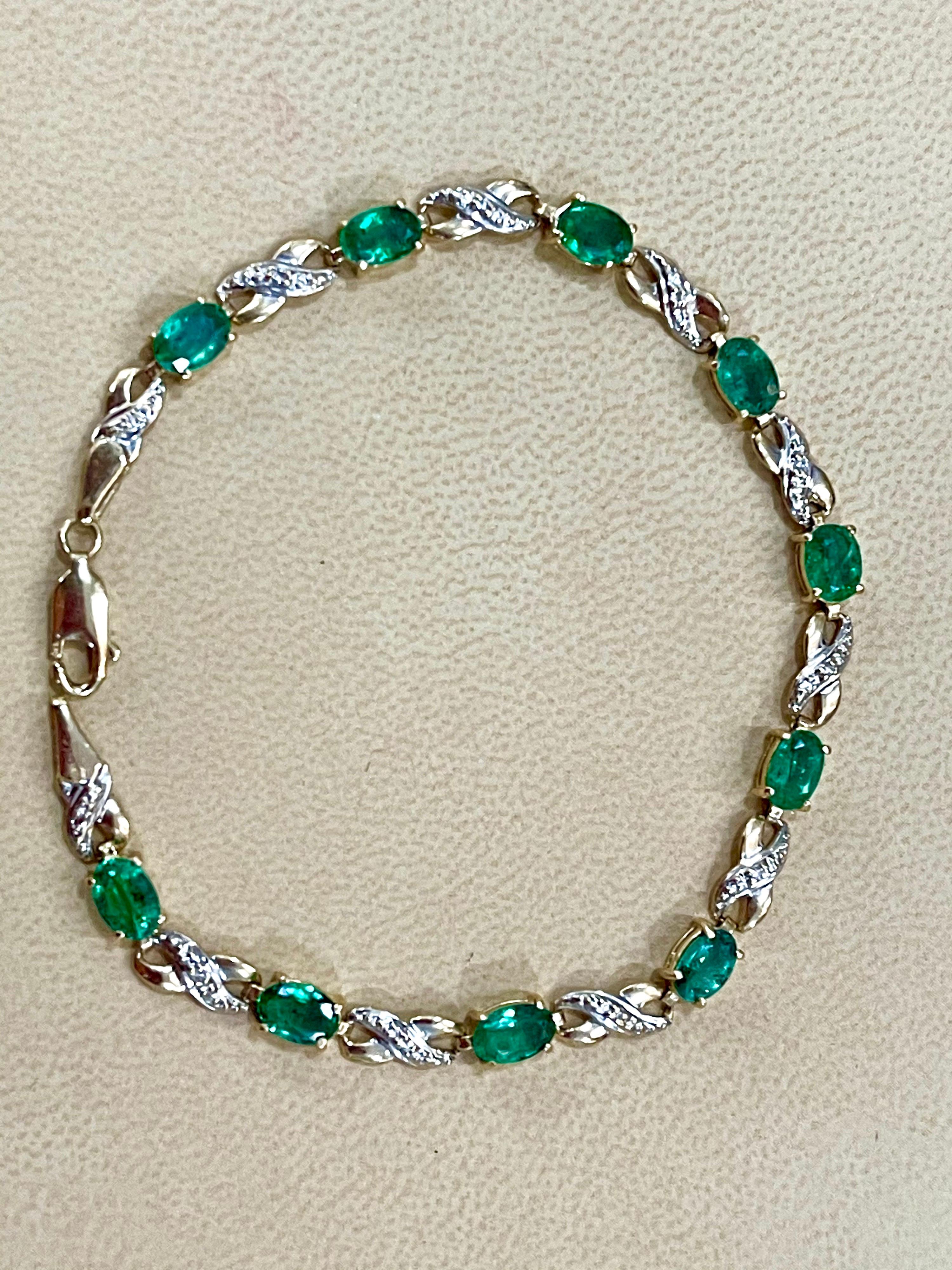  Approximately 2.5  Carat Natural Emerald Tennis Bracelet 14 Karat Yellow Gold with Diamond Accent
This exceptionally affordable Tennis  bracelet has 10 stones of oval shape natural emeralds
Emeralds are Brazilian quality is good
This is a clearance