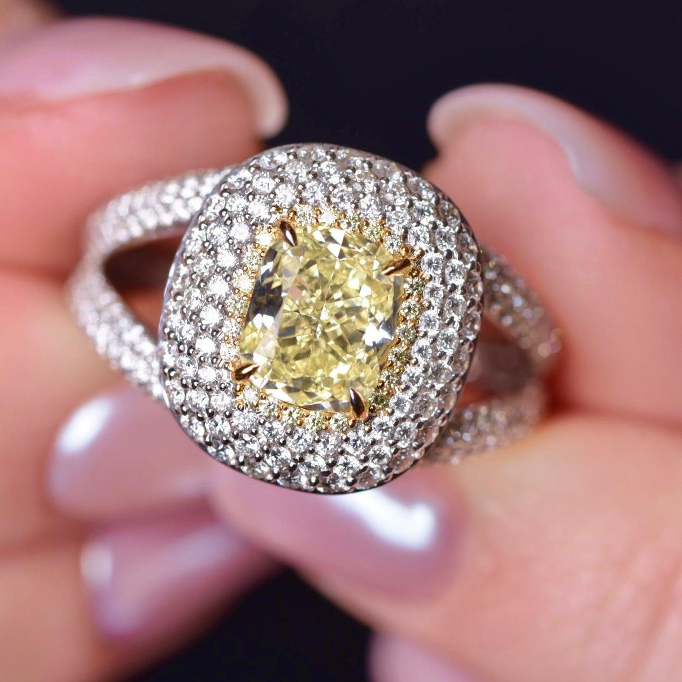 For Sale:  2.5 Carat Fancy Yellow Diamond and White Diamond 18 Karat White Gold Ring 2