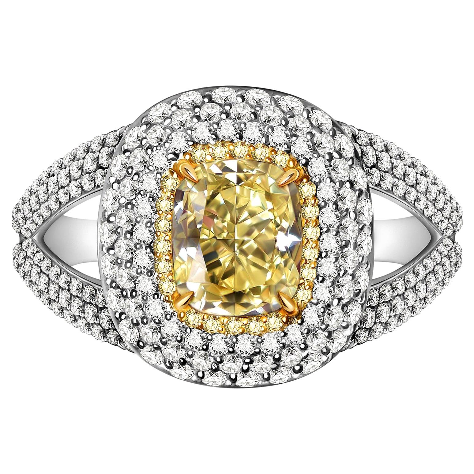 For Sale:  2.5 Carat Fancy Yellow Diamond and White Diamond 18 Karat White Gold Ring