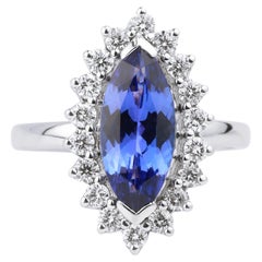Anillo de compromiso de cóctel con halo de diamantes tanzanita AAA natural de 2,5 quilates y oro de 18k