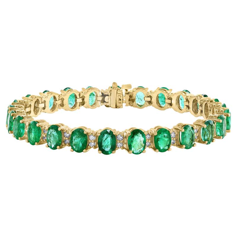Flexible Baguette Emerald 18 Karat Gold Bangle Bracelet For Sale at 1stDibs