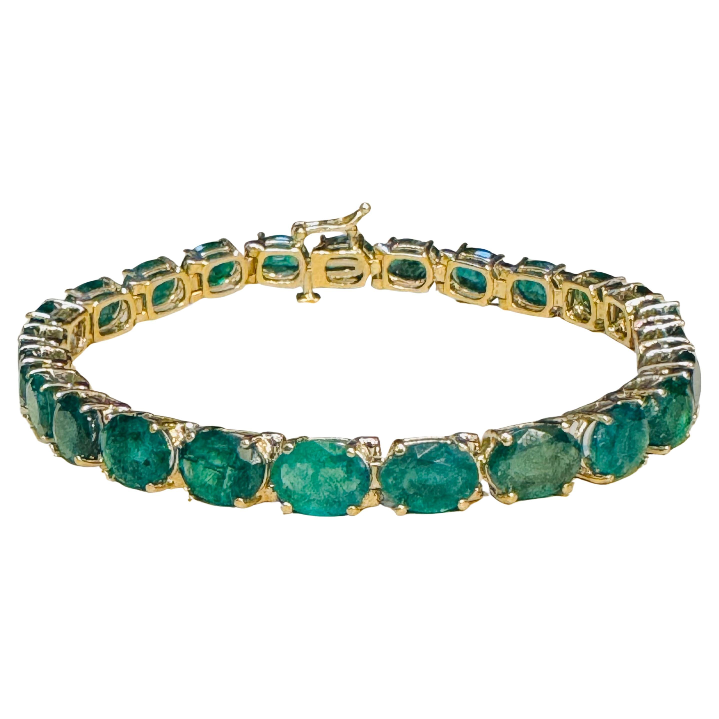  This exceptionally affordable Tennis  bracelet has  25  stones of oval  Emeralds  .  Total weight of the Emeralds is  approximately 25 carat. 
The bracelet is expertly crafted with 19.7 grams of  14 karat Yellow  gold . Have a safety clasp .
large