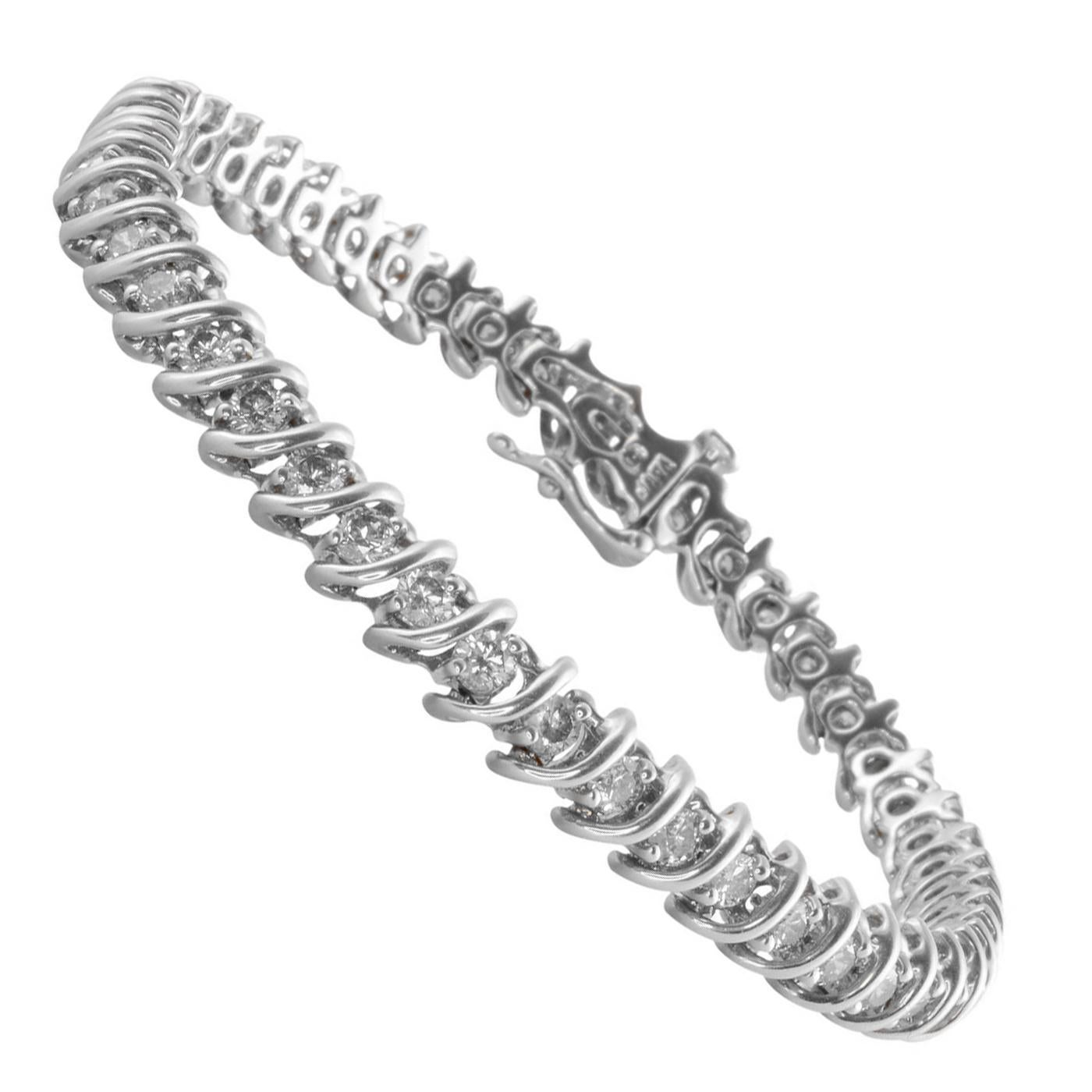 Have you always wanted a tennis bracelet? This is one that you could wear every day, all day, and even to bed! This 2.5-carat total-weight diamond tennis bracelet is made really well with well-constructed links and nice secure prongs that hold the