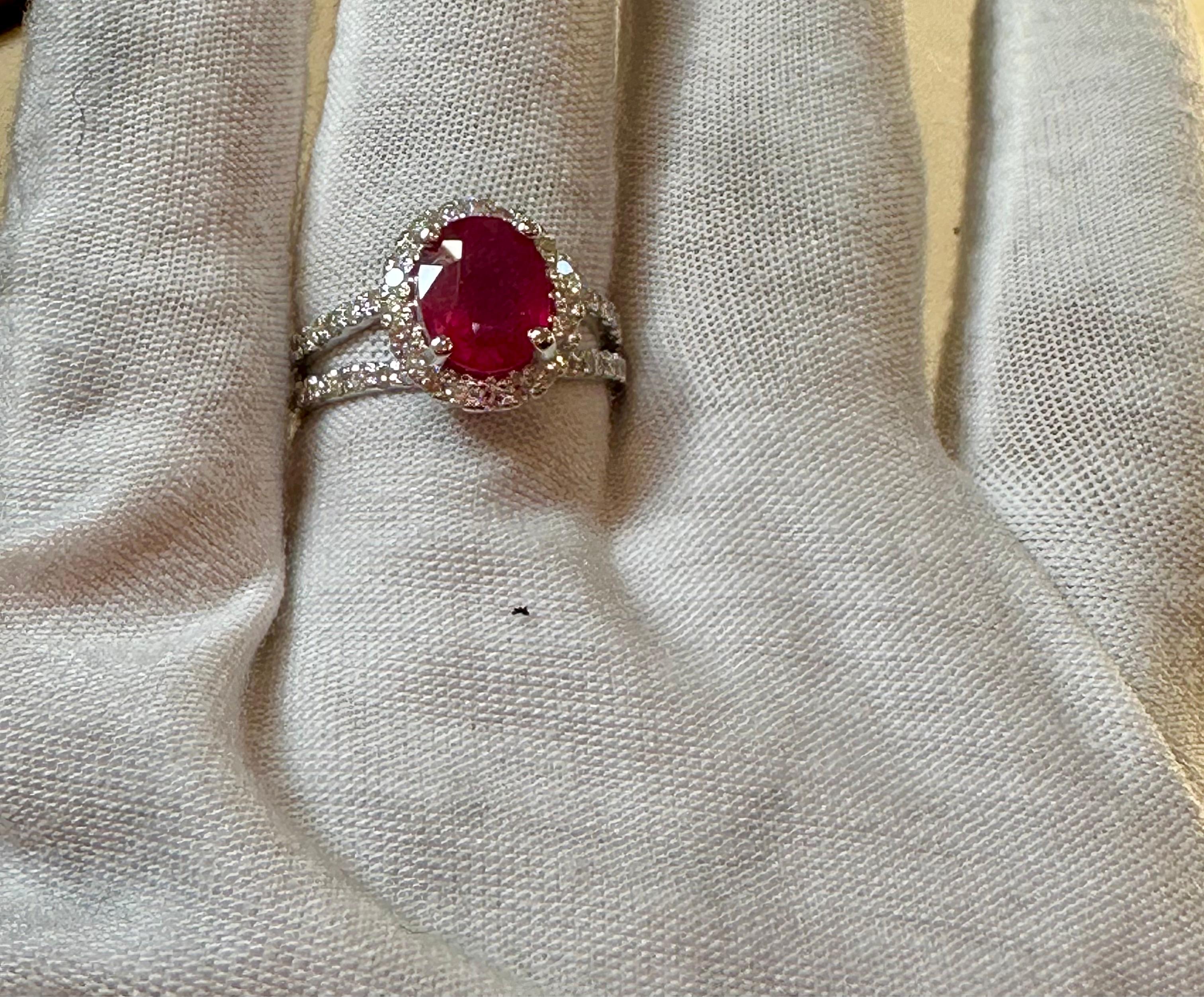2.5 Carat Oval Treated Ruby & 2 ct Diamond Ring 14 Karat White Gold Size 7 In New Condition For Sale In New York, NY
