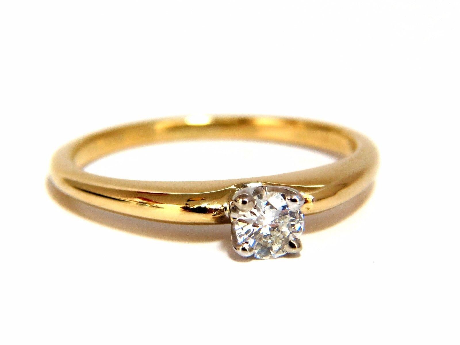 Solitaire Petite

.25ct. Natural round cut brilliant diamond

solitaire ring.

Vs-2 clarity / H color.

center diamond: 3.7mm

14kt yellow gold.

1.9 Grams

Current ring size: 5.25

May professionally resize, please inquire