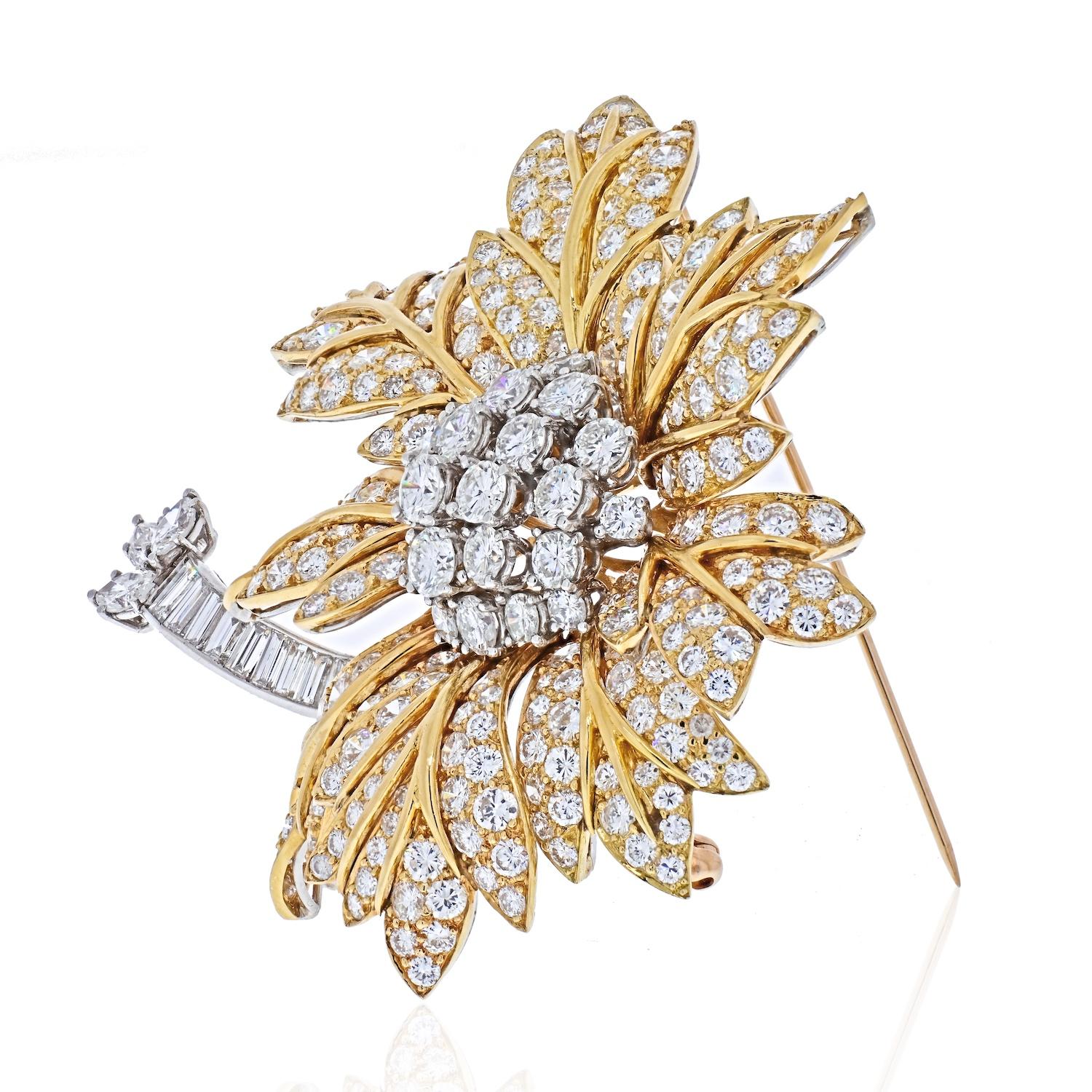 This is a Diamond Vintage Brooch, meticulously crafted in platinum and 18k yellow gold and adorned with an array of dazzling full-cut diamonds. This brooch exudes timeless sophistication with its classic design, featuring a captivating combination