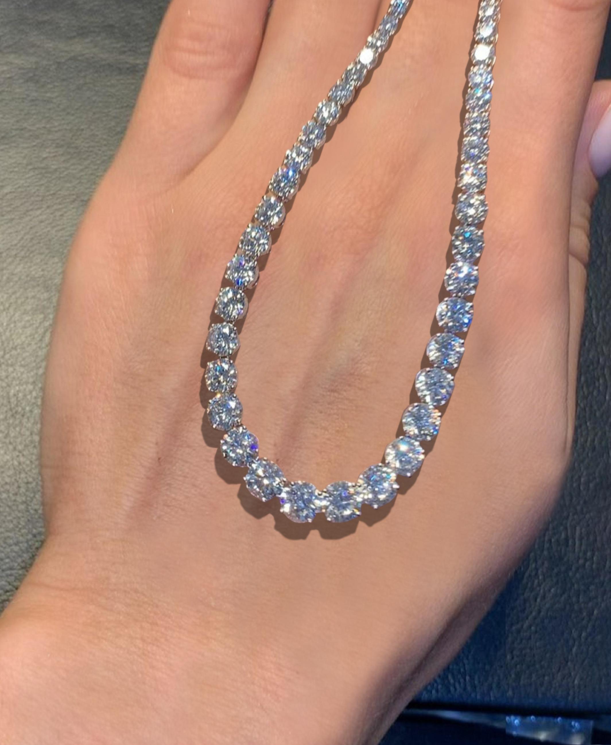 A 25 carat round diamond tennis necklace featuring F color and a mix of VVS to VS clarity diamonds with excellent luster and performance would be an extraordinary piece of jewelry.

The F color grade signifies that the diamonds are near colorless,