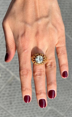 2.5 carat rose-cut diamond mounted on 18k gold.