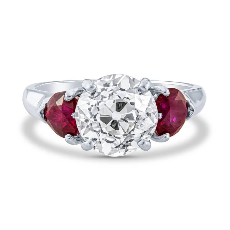 2.5 Carat Round Cut Diamond and Ruby Estate Three-Stone Ring in Platinum For Sale