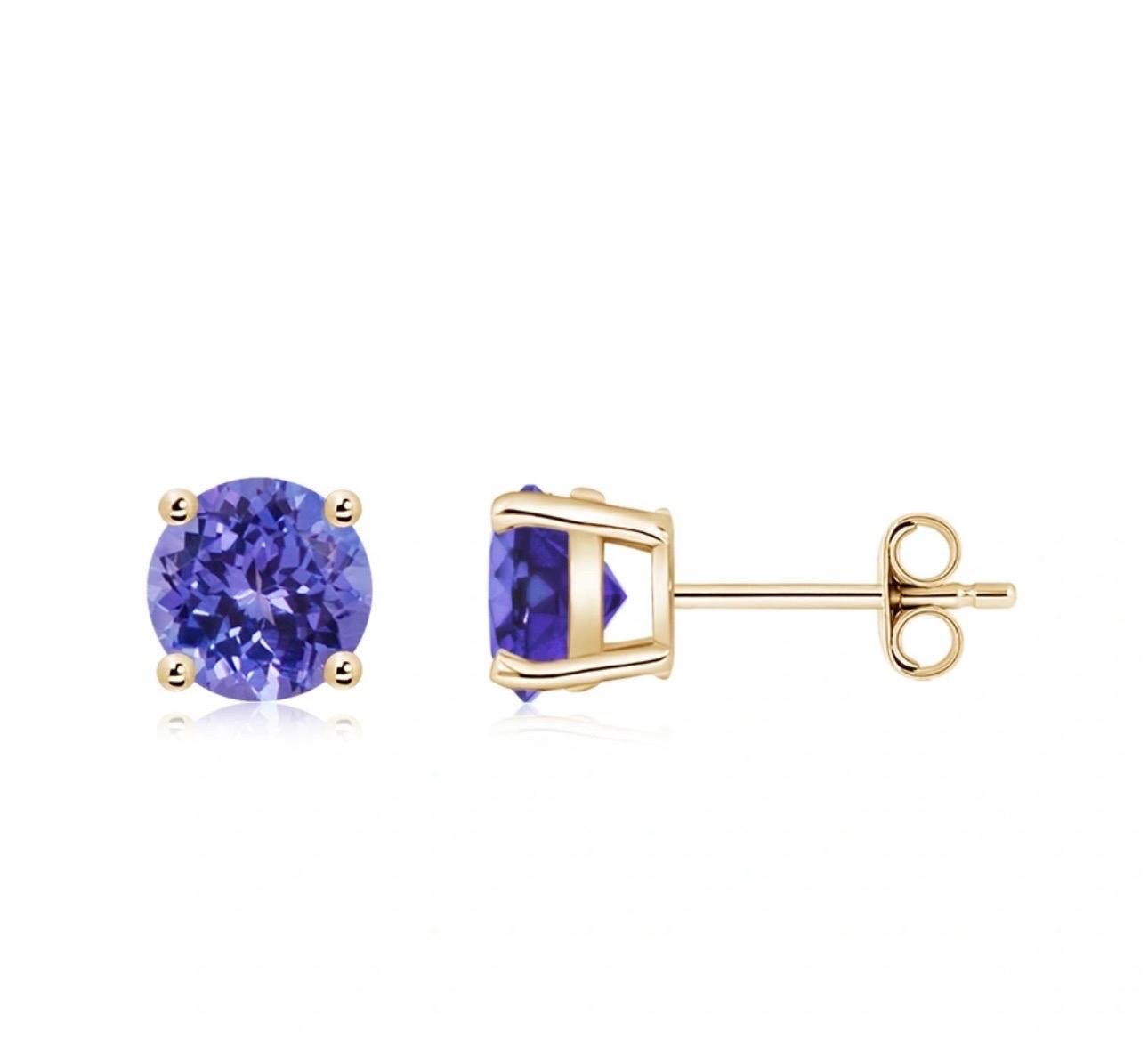 
2.5  Carat finest Round Cut Tanzanite.  perfect pair   Post  Earrings  14 Karat  Yellow Gold 
This exquisite pair of earrings are beautifully crafted with 14 karat Yellow gold .
Weight of 14 K gold 1.5 grams
 Fine  Round Cut Tanzanite weighing