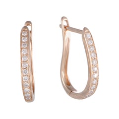.25 Carat Small 14 Karat Rose Gold Diamond Oval Hoop Earrings