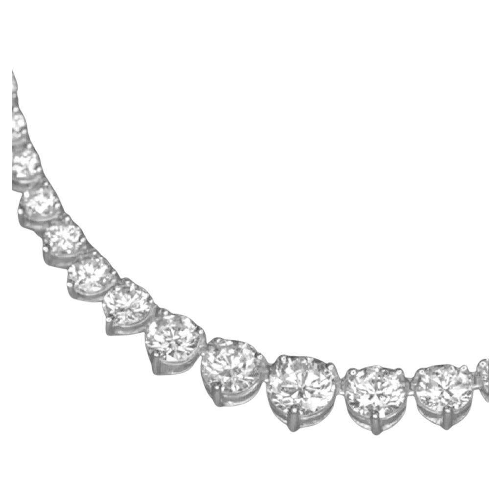 An exquisite riviera tennis necklace set in 18 carat white gold round diamonds. 


