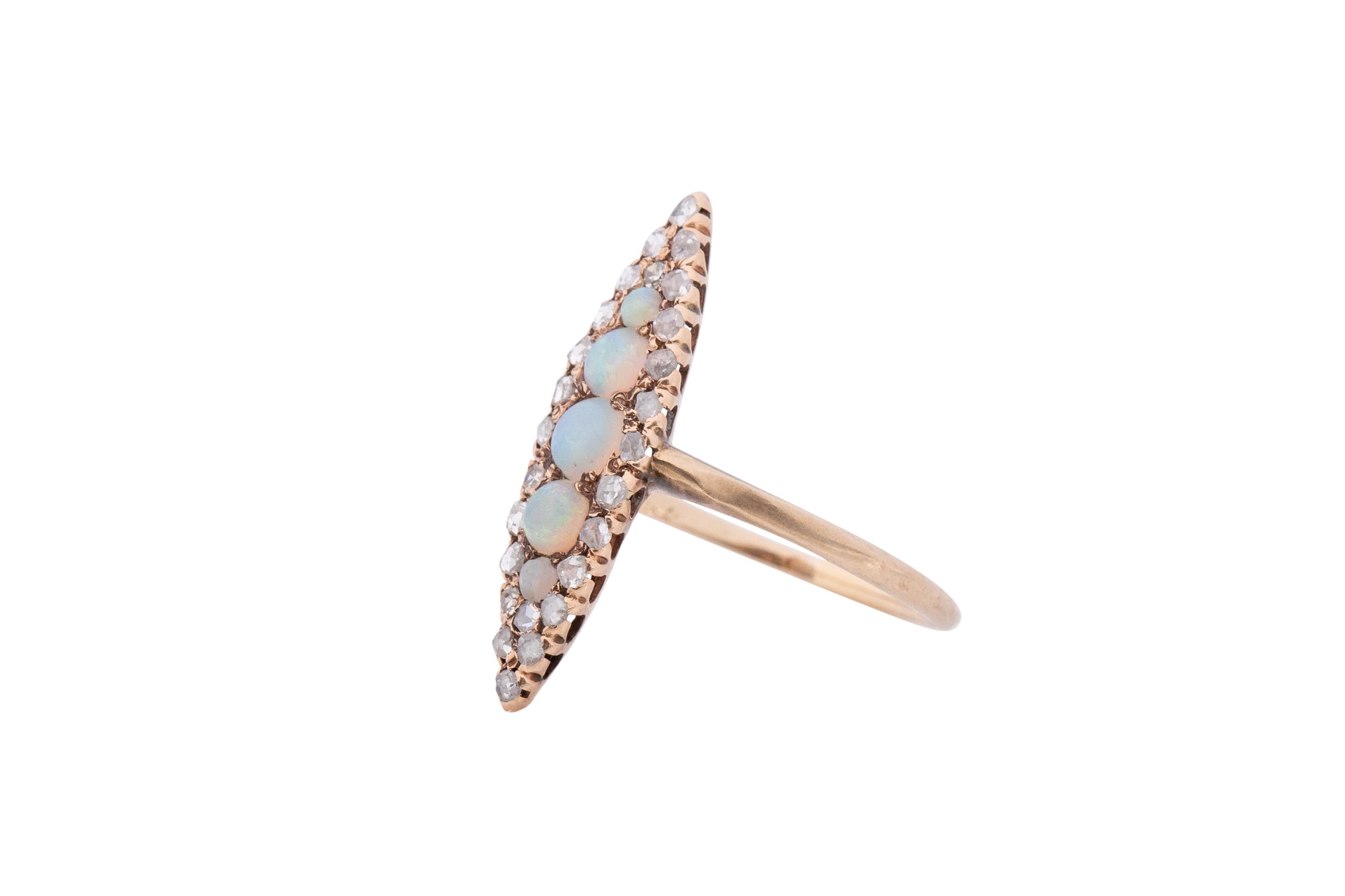 Item Details: 
Ring Size: 7.25
Metal Type: 14 karat Rose Gold [Hallmarked, and Tested]
Weight: 1.9 grams

Diamond Details:
Weight: .25 carat total weight
Cut: Antique Rose Cut
Color: Mixed, J-K-L
Clarity: SI

Opal Details:
Weight: .60 carat total